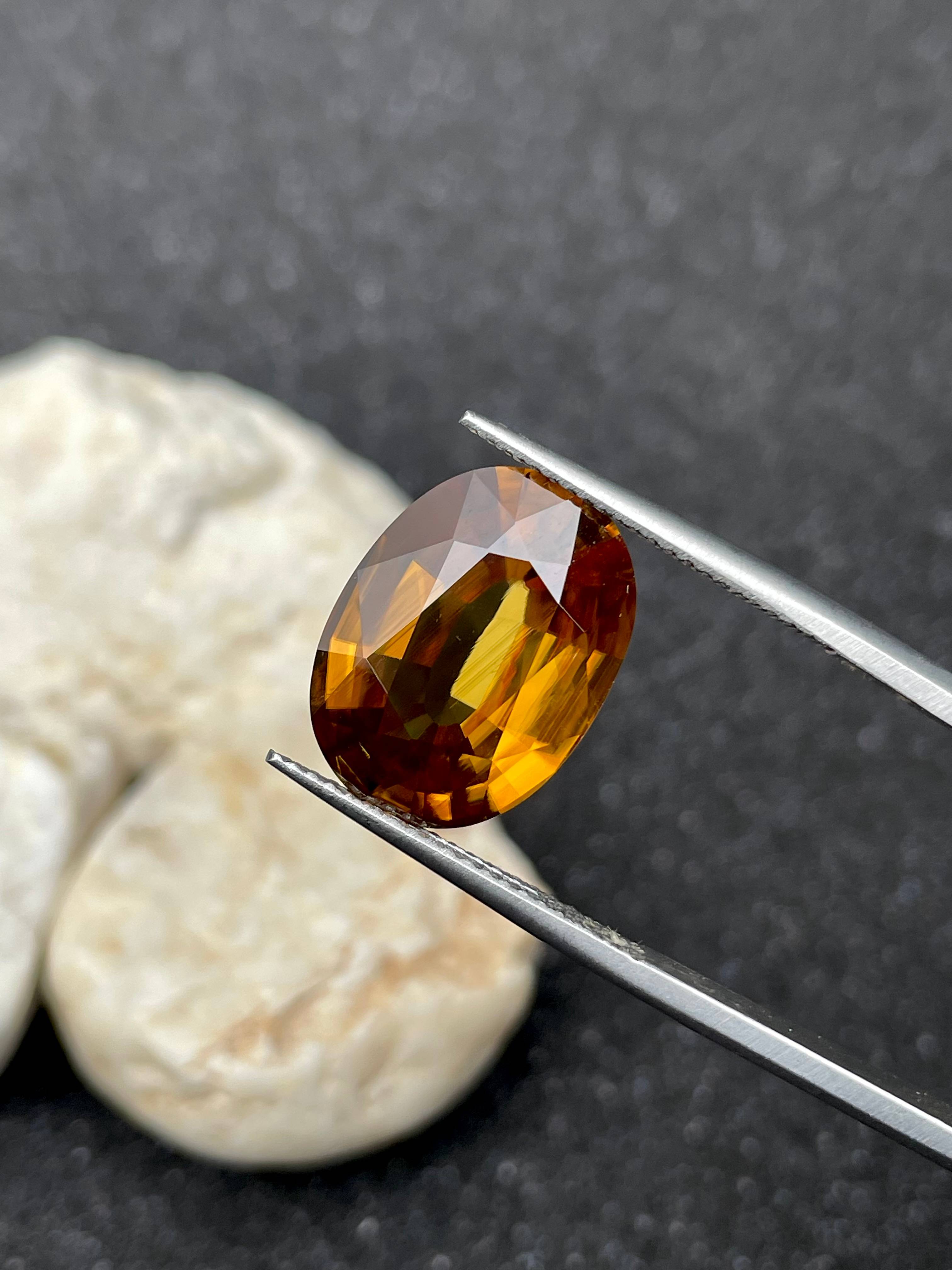 honey yellow sphene, 7.21ct oval cut — view 5