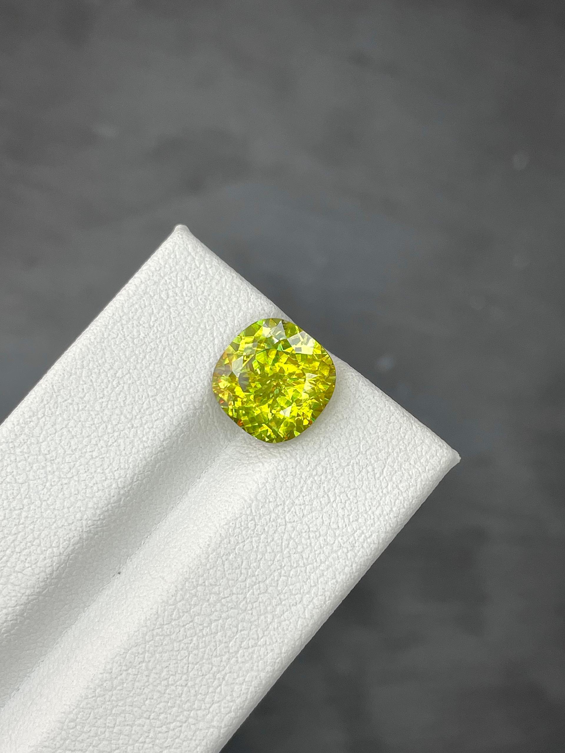 lime green sphene, 4.33ct cushion cut — view 5