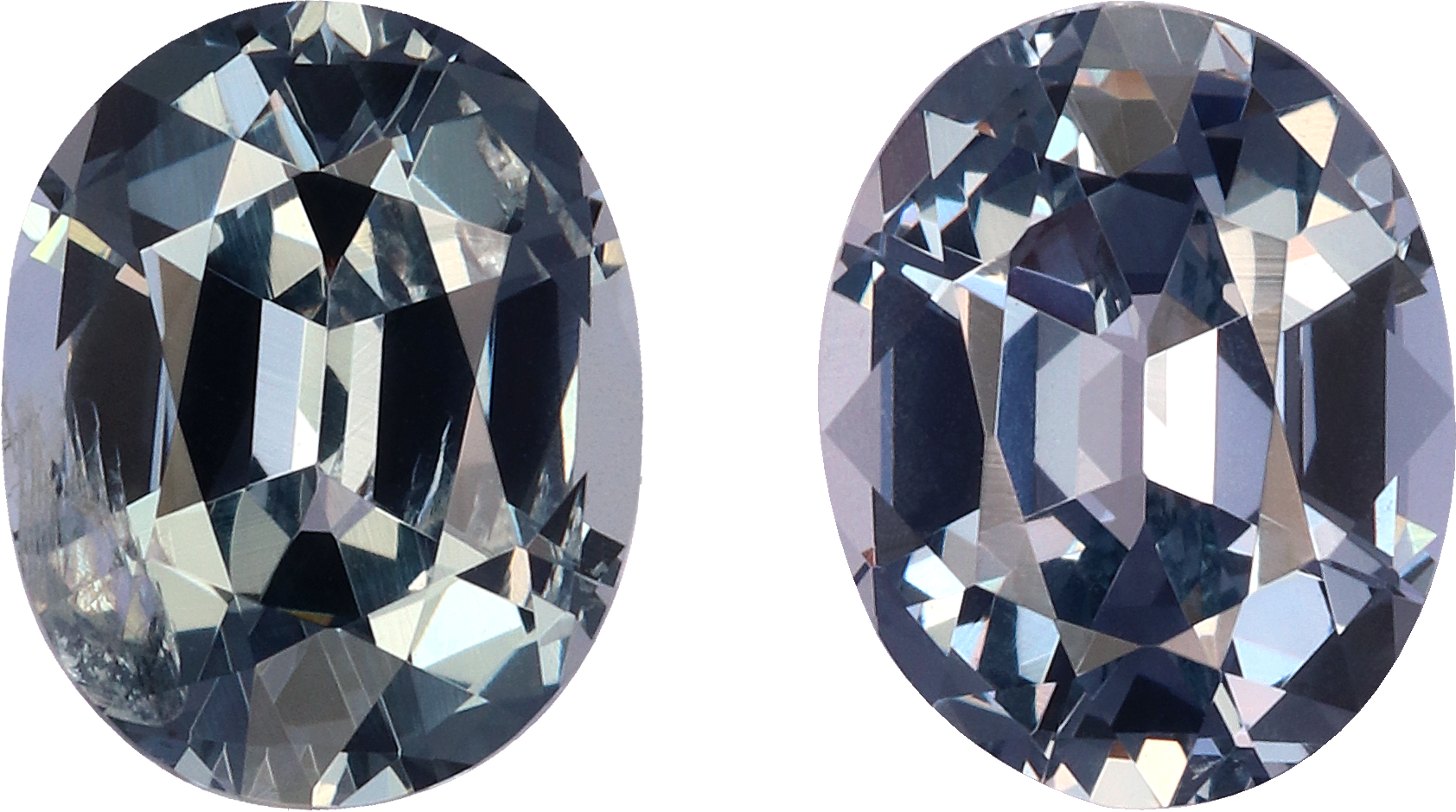 Oval cut grey spinel, 6.78 by 5.38 mm, shown at actual size