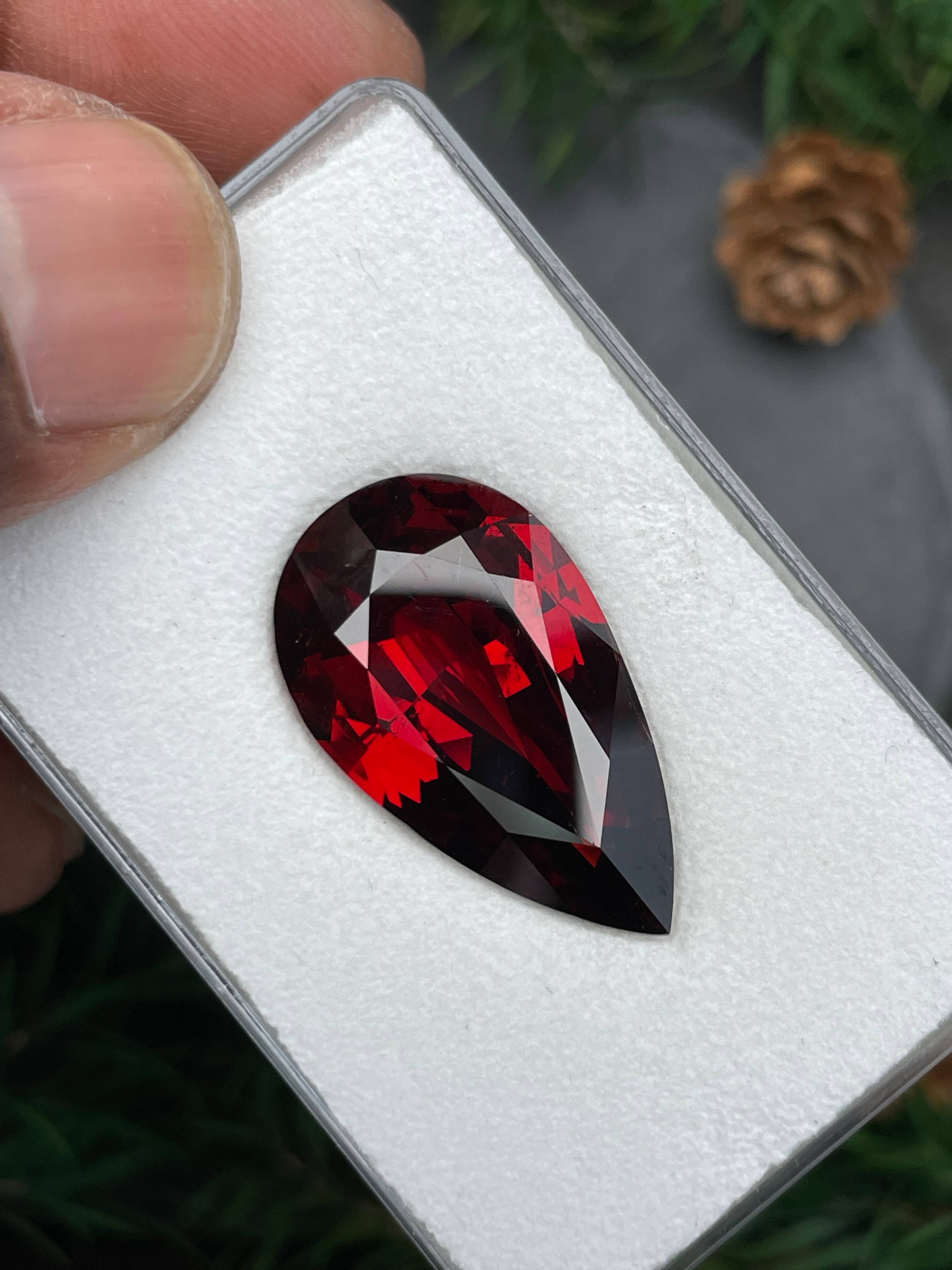 scarlet red spessartite garnet, 27.07ct pear cut — view 6