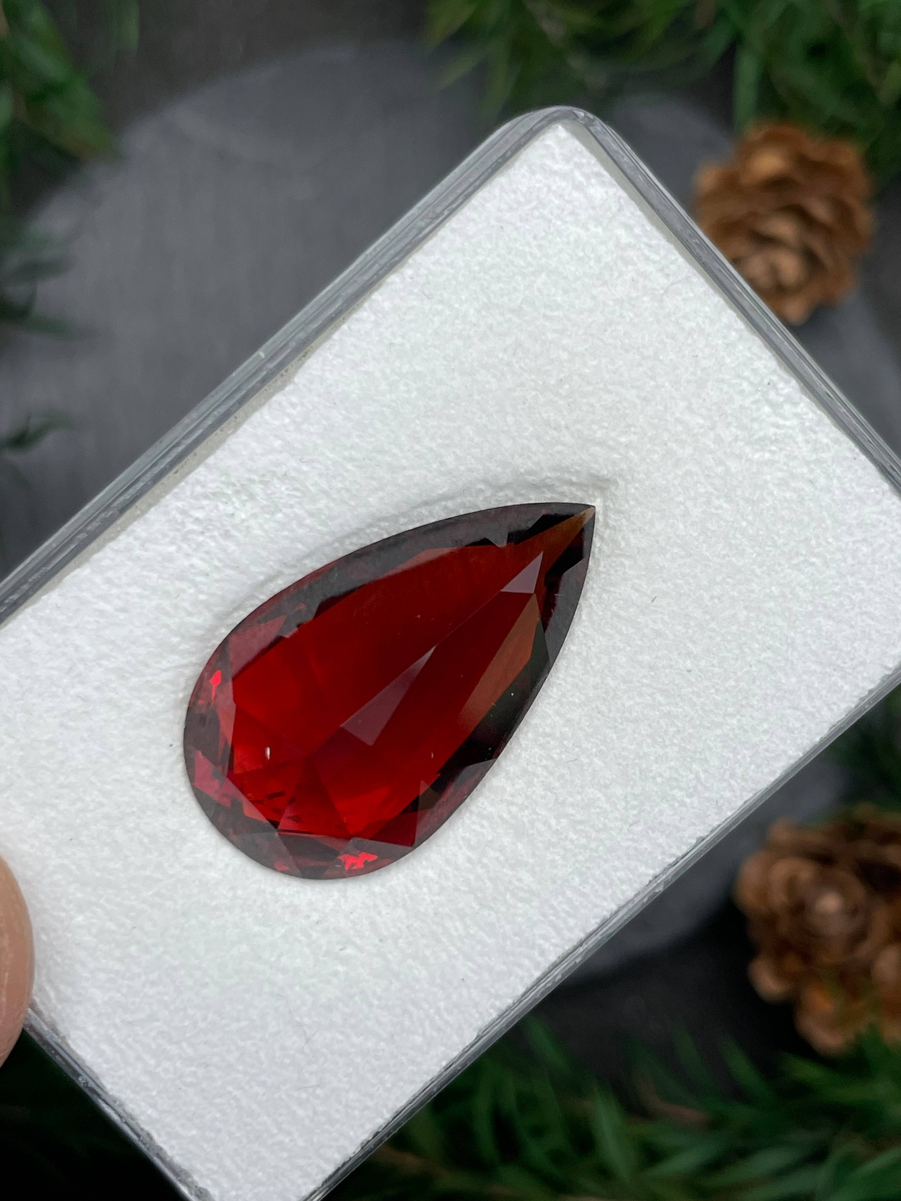 scarlet red spessartite garnet, 27.07ct pear cut — view 7