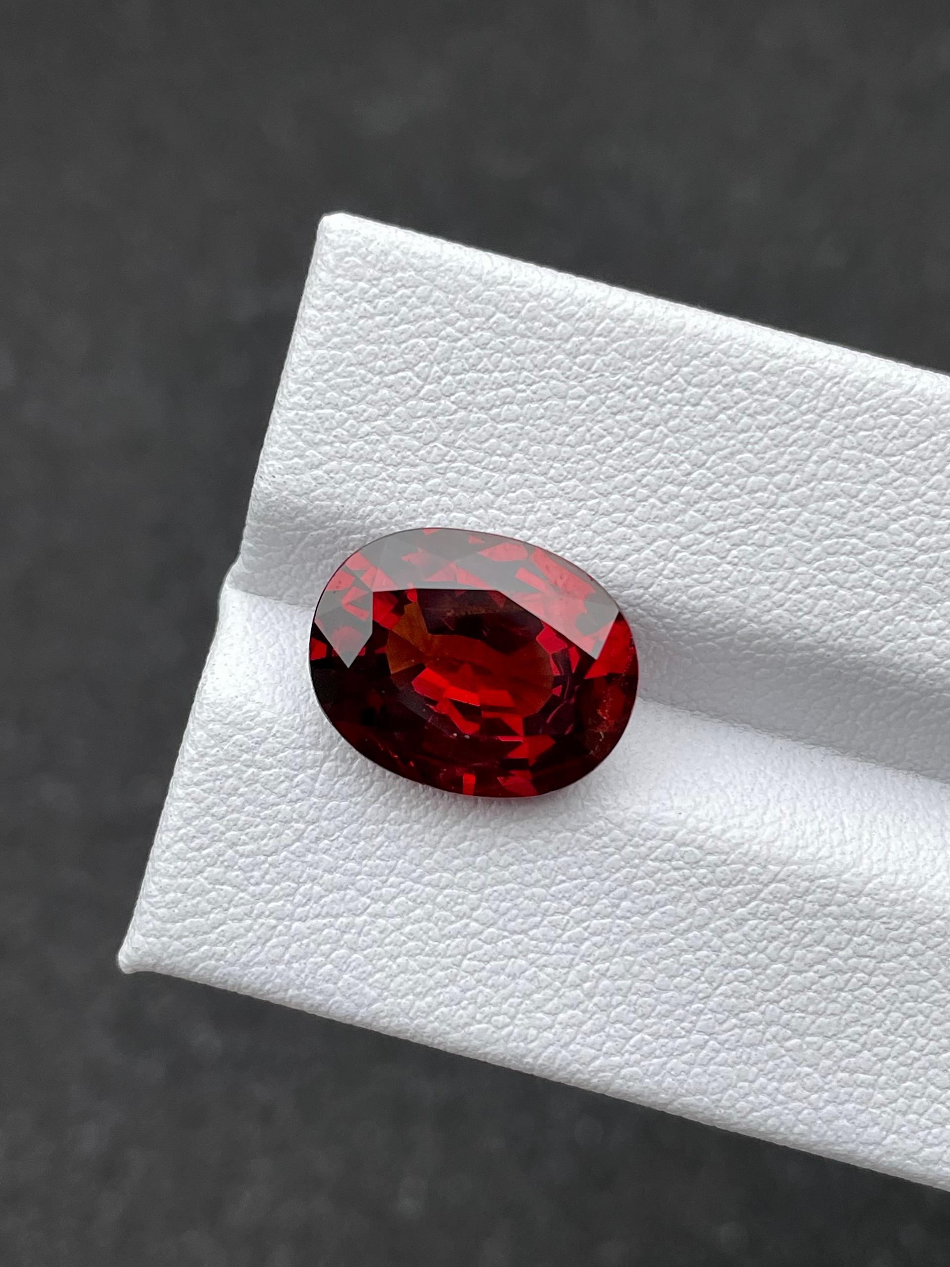 scarlet red spessartite garnet, 7.02ct oval cut — view 6
