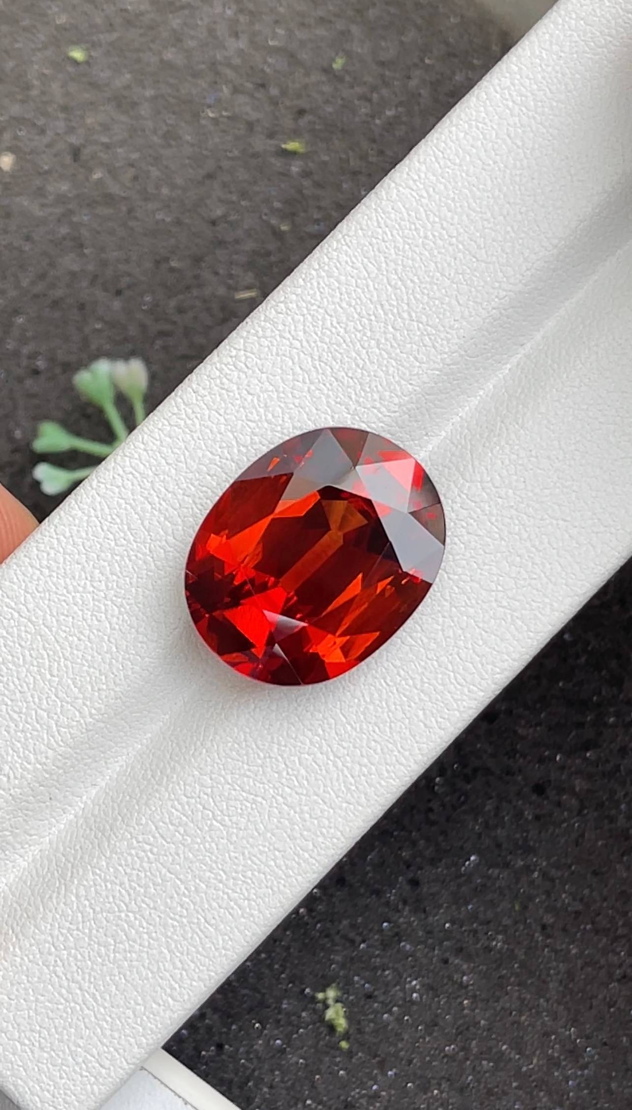 orange spessartite garnet, 22.15ct oval cut — view 5