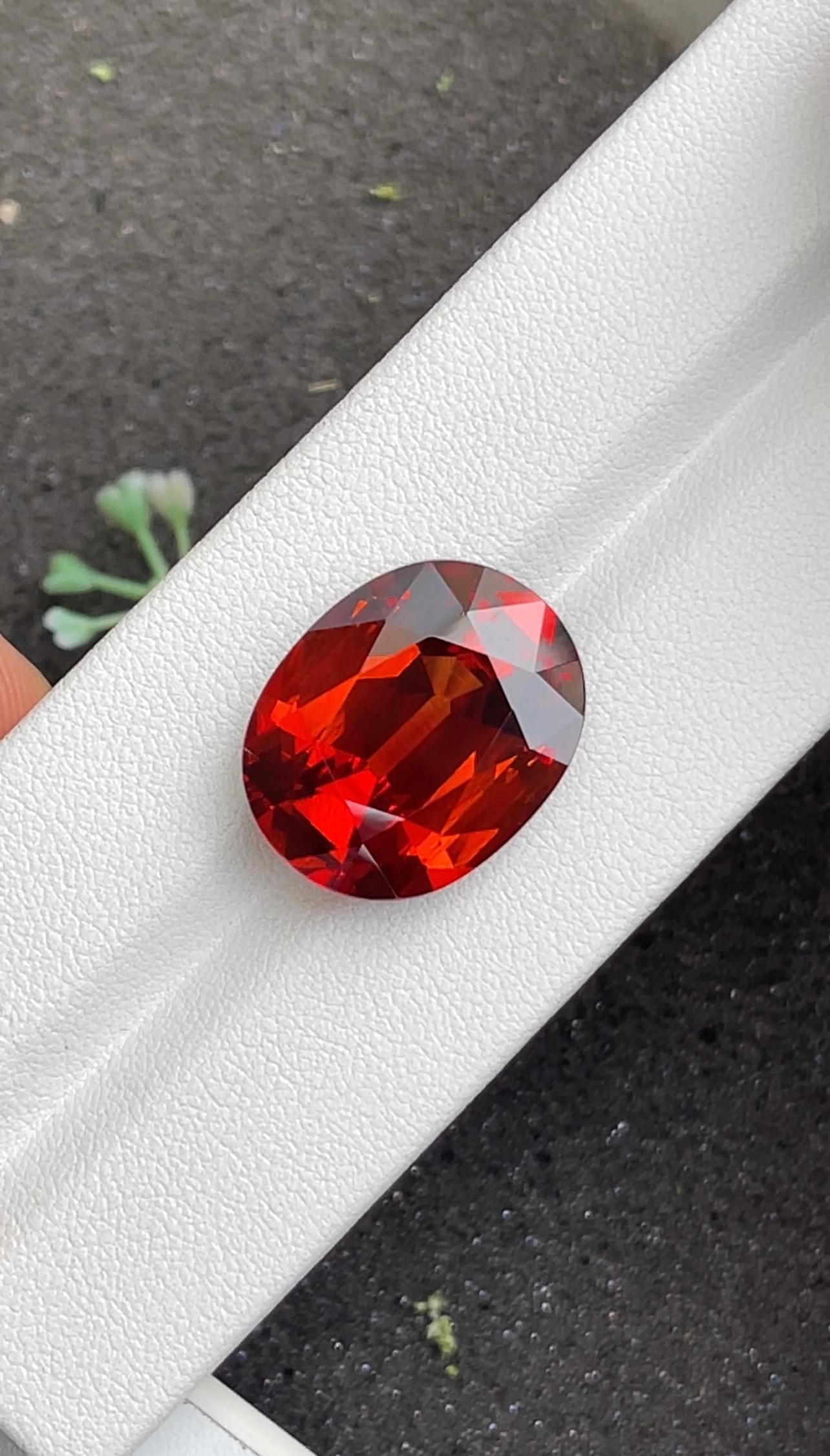orange spessartite garnet, 22.15ct oval cut — view 5