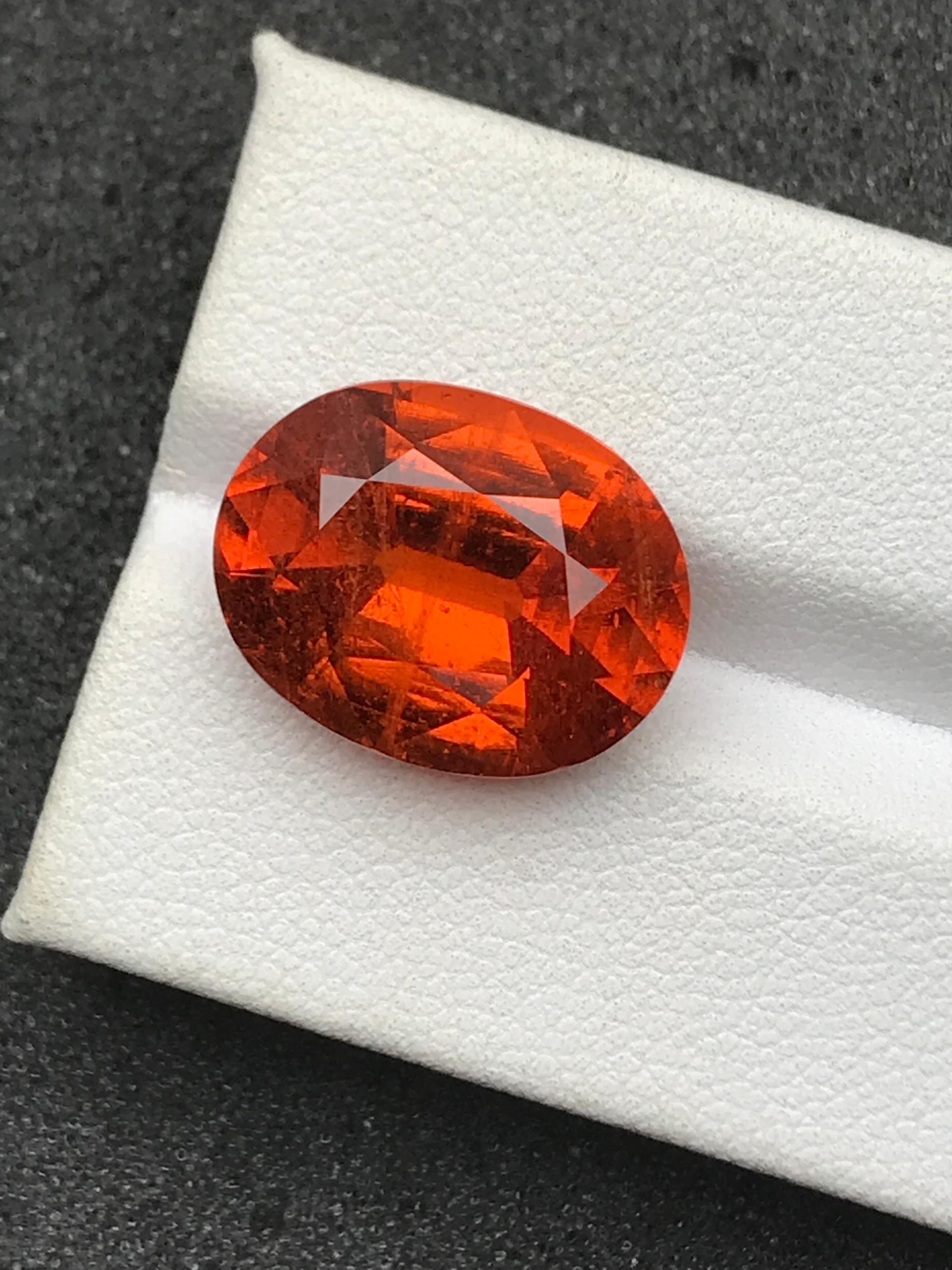 orange spessartite garnet, 15.94ct oval cut — view 5