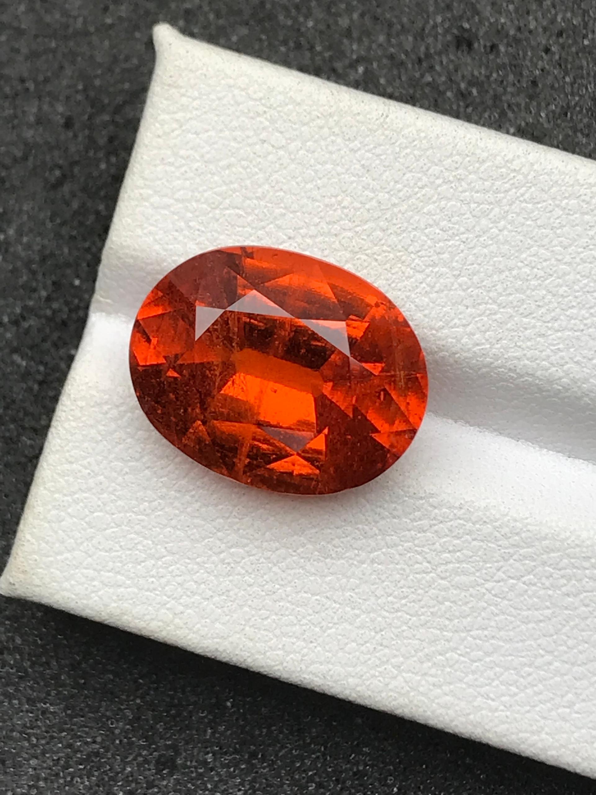 orange spessartite garnet, 15.94ct oval cut — view 6