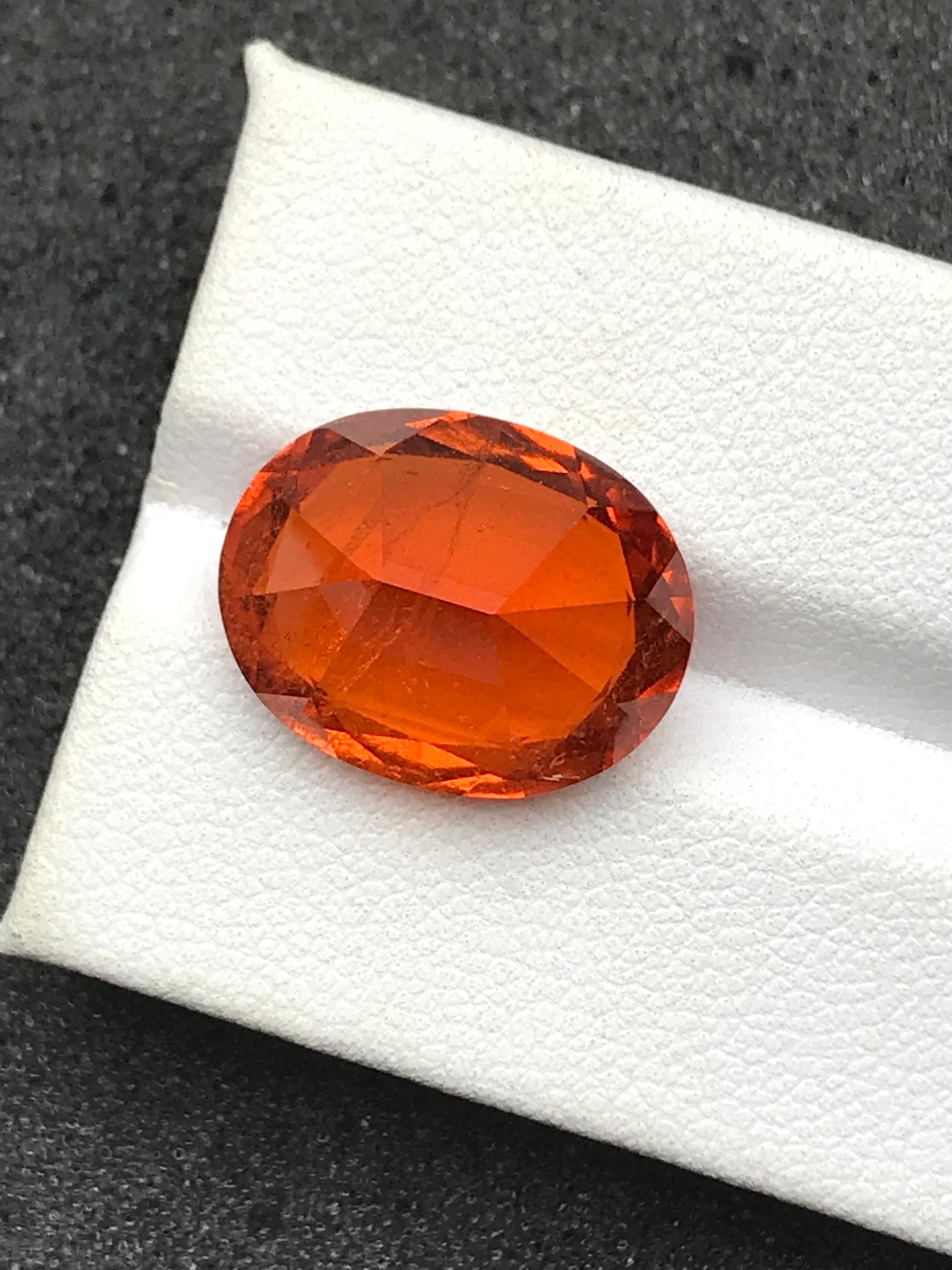 orange spessartite garnet, 15.94ct oval cut — view 7