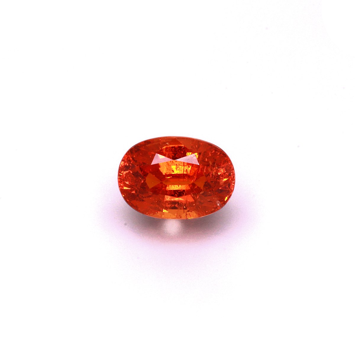 orange spessartite garnet, 8.24ct oval cut — main view
