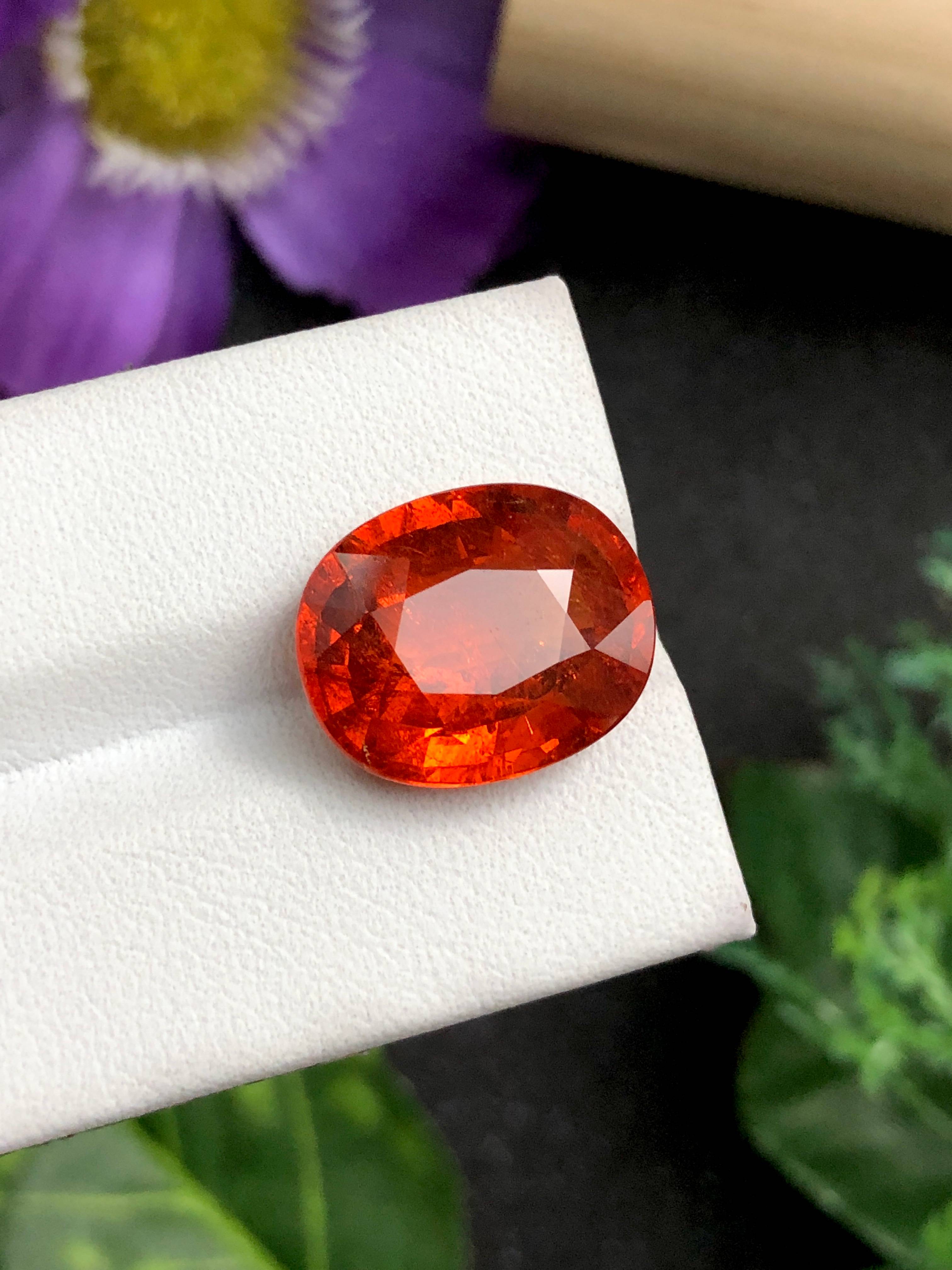 mandarin orange spessartite garnet, 15.24ct oval cut — view 9