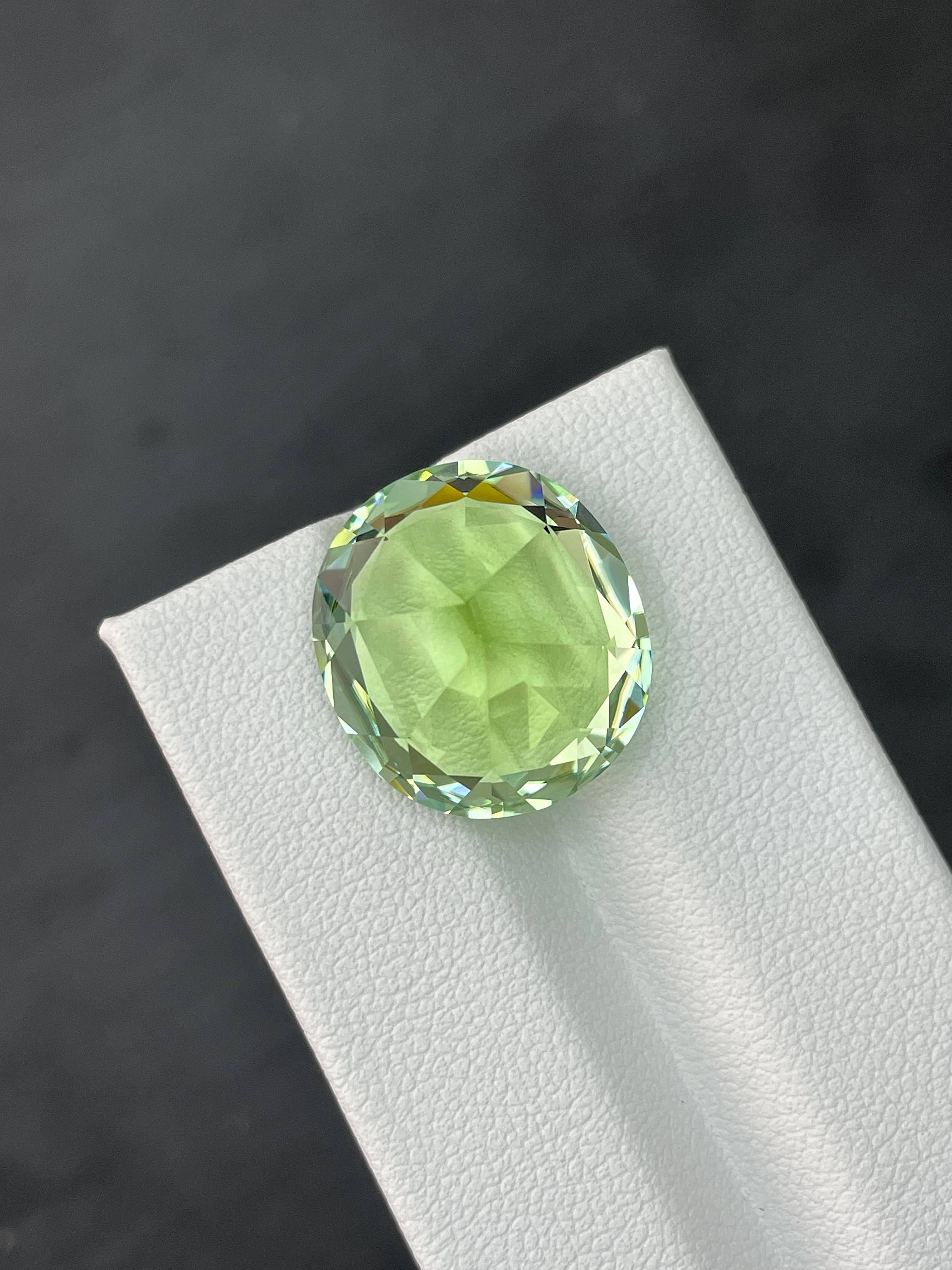 green green tourmaline, 18.83ct oval cut — view 6