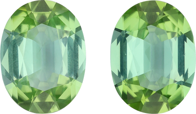 Oval cut green tourmaline, 13.53 by 10.16 mm, shown at actual size