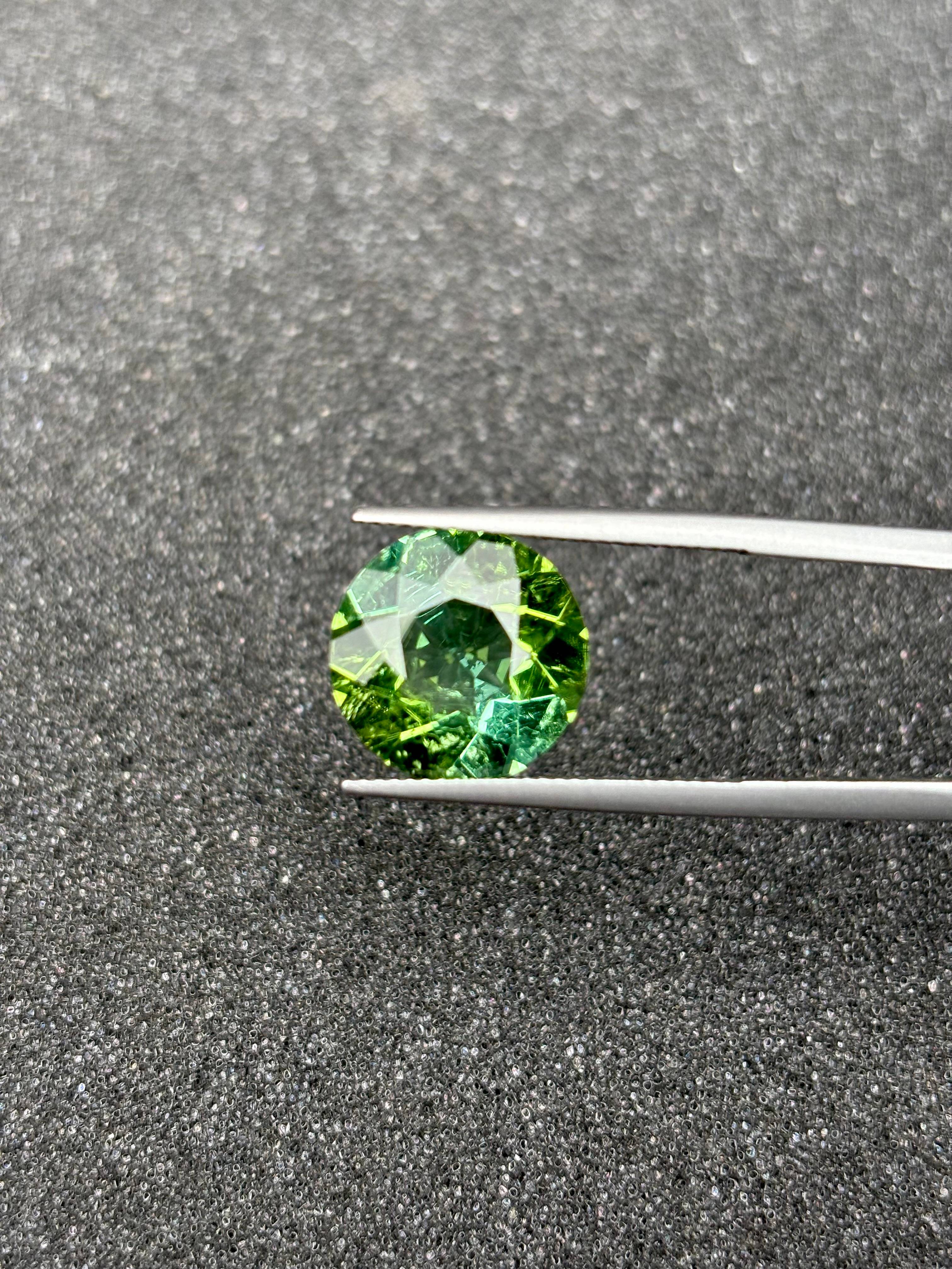 forest green green tourmaline, 15.18ct oval cut — view 5