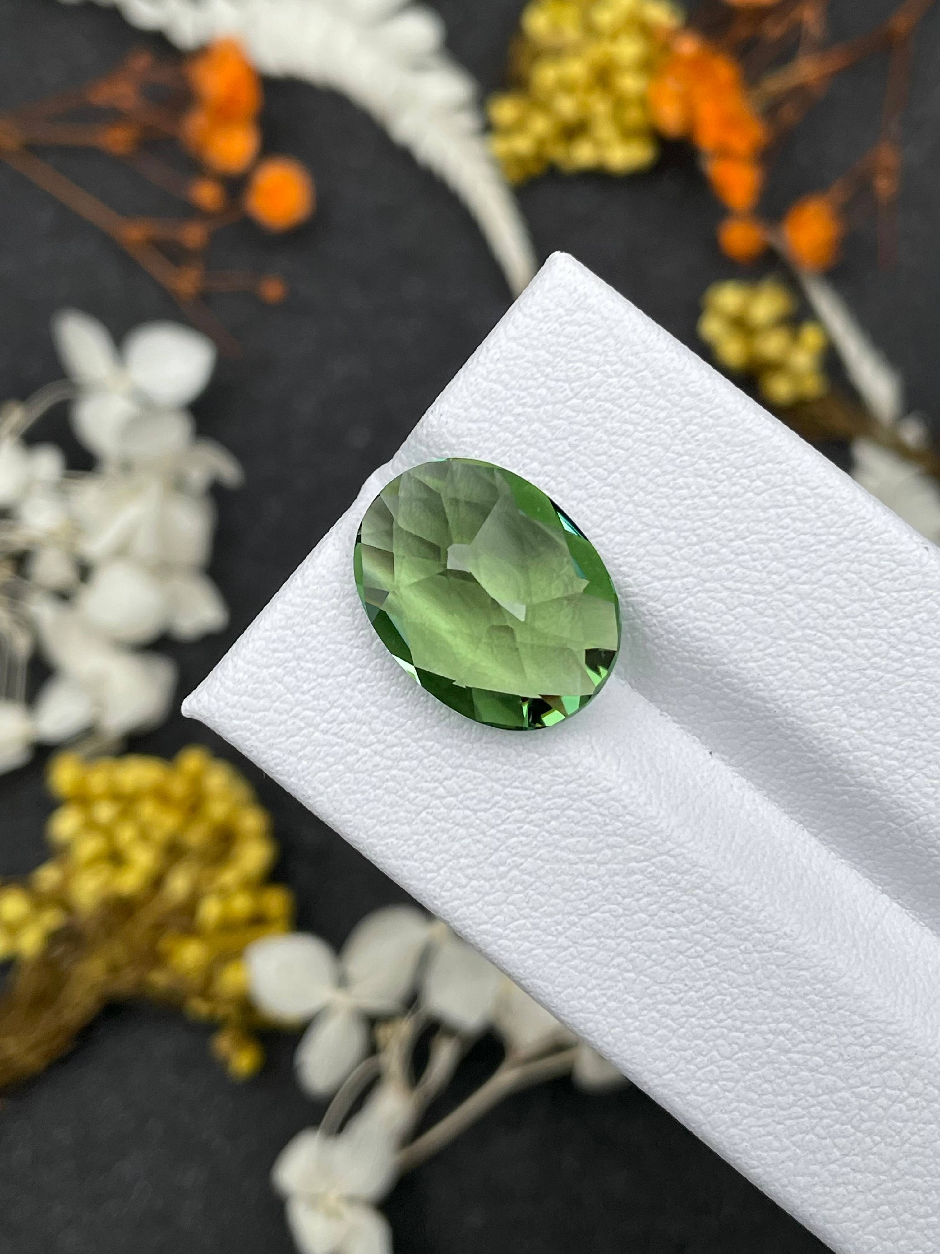 green green tourmaline, 6.92ct oval cut — view 6