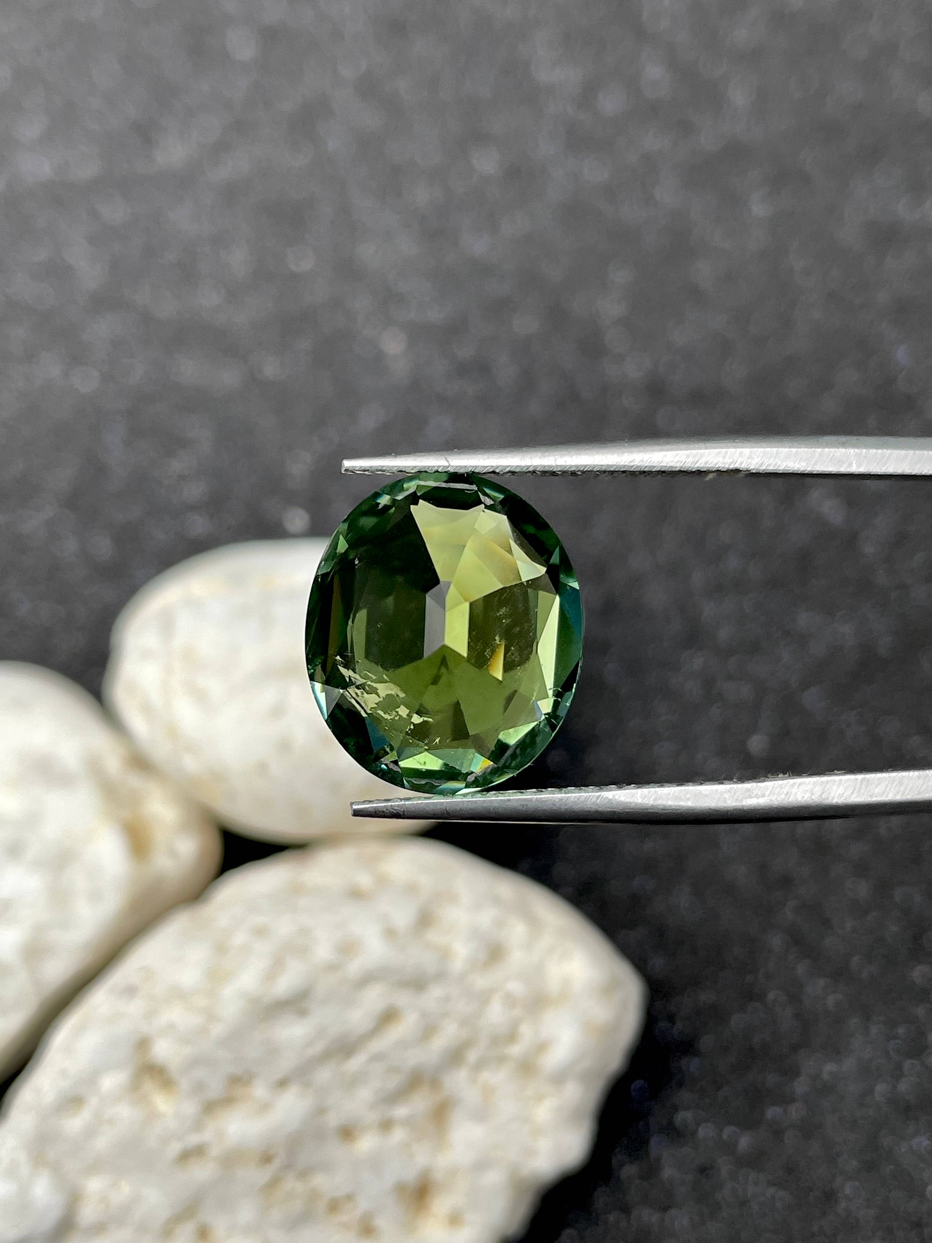 olive green green tourmaline, 7.91ct oval cut — view 6