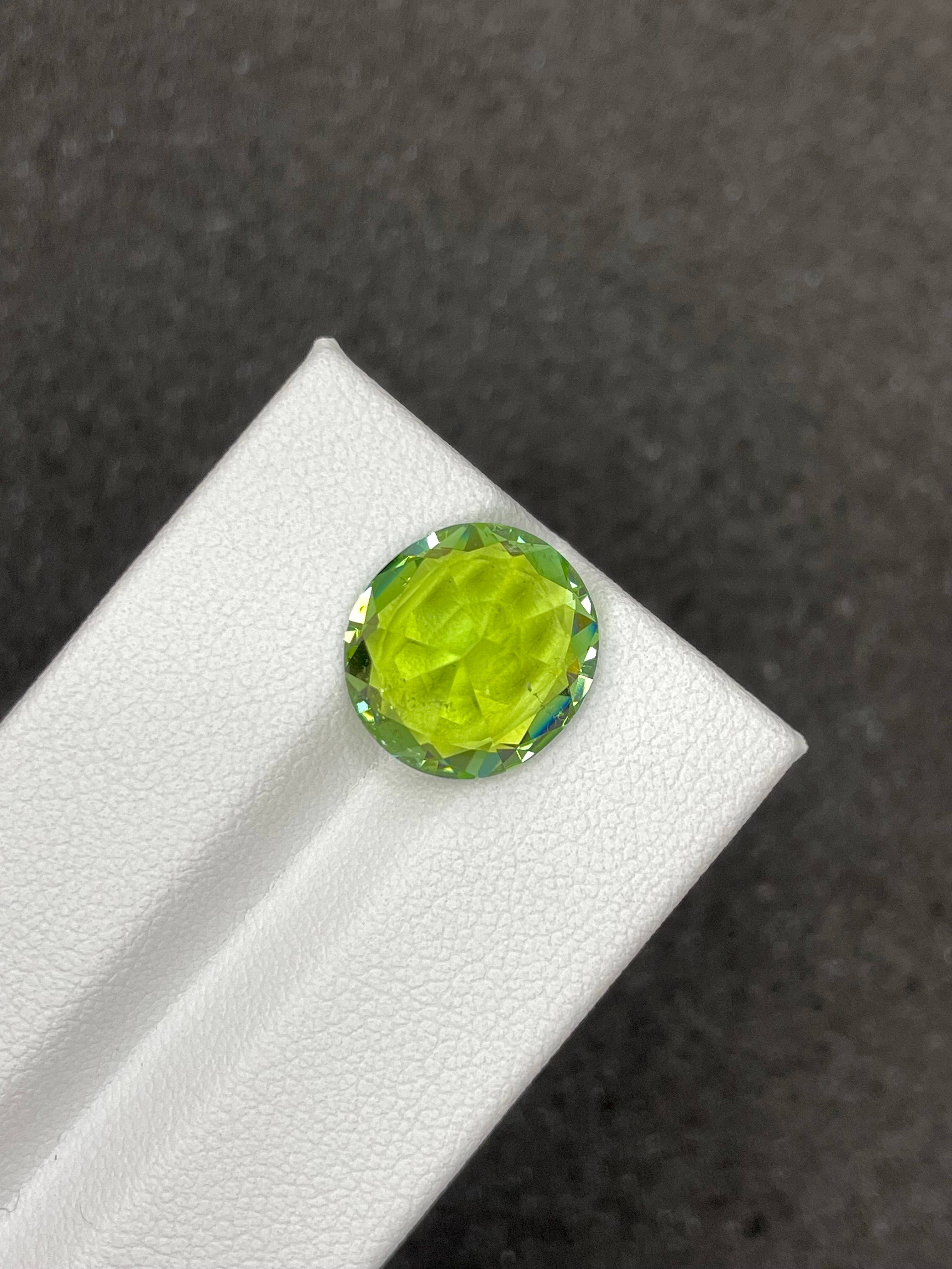 green green tourmaline, 6.53ct oval cut — view 6
