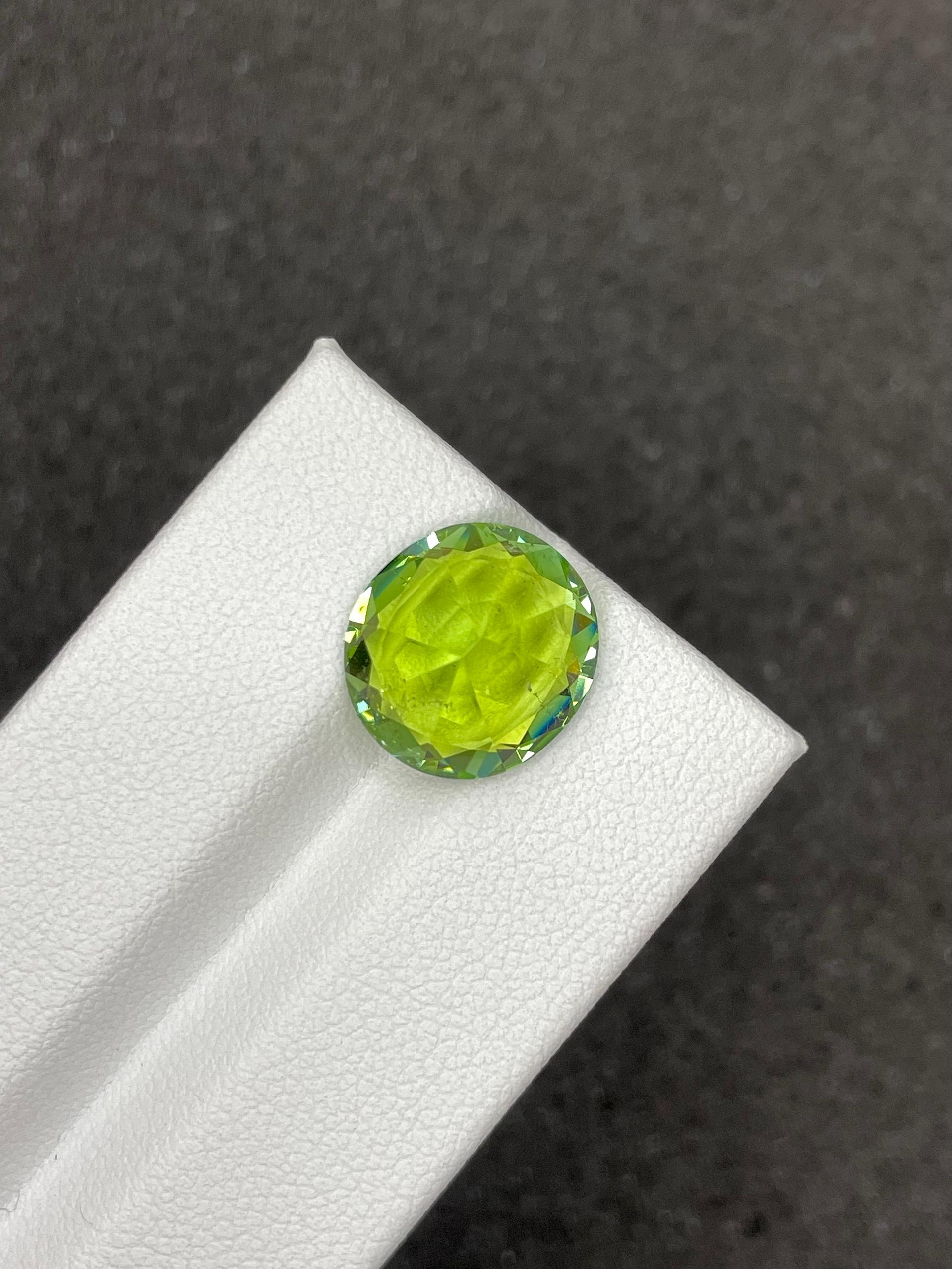 green green tourmaline, 6.53ct oval cut — view 6