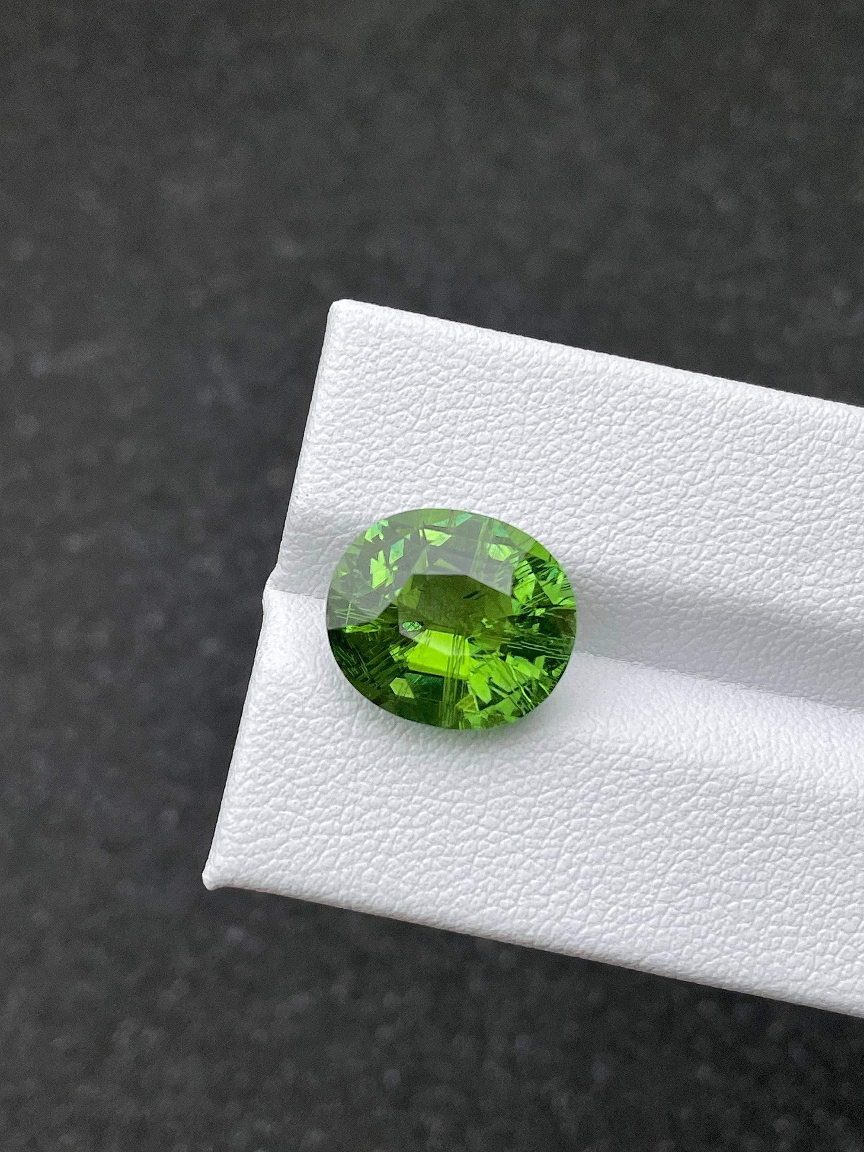 pistachio green green tourmaline, 6.35ct oval cut — view 5