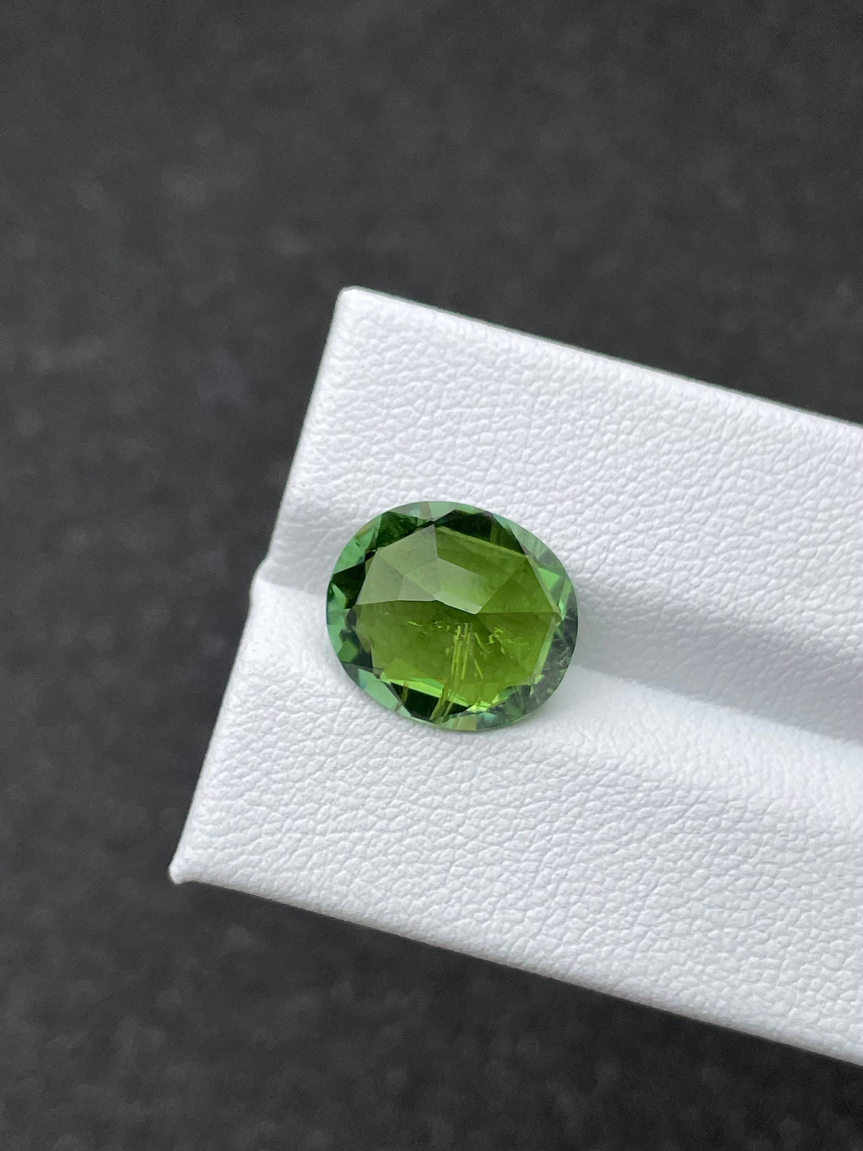 pistachio green green tourmaline, 6.35ct oval cut — view 7