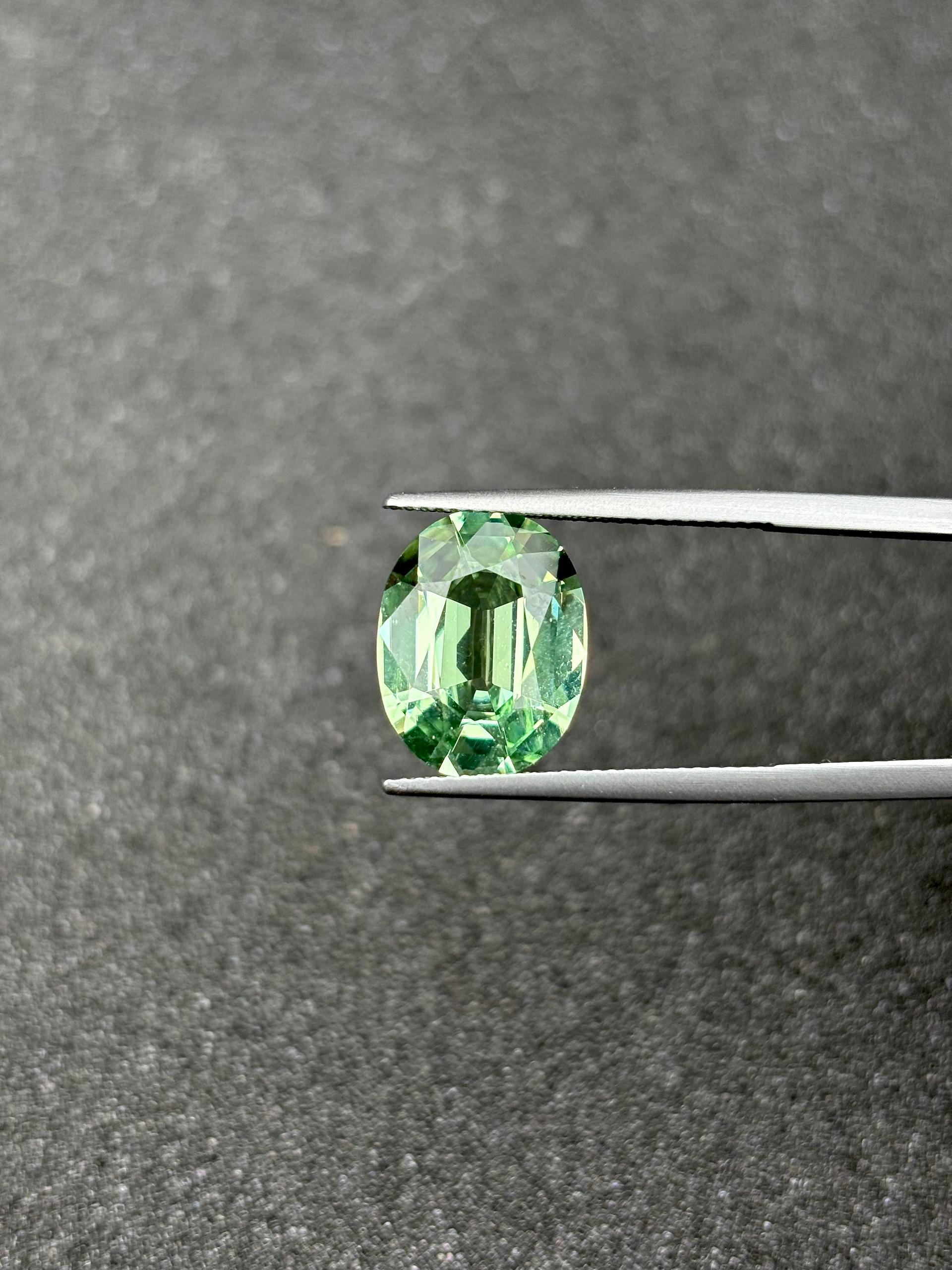 lime green green tourmaline, 6.72ct oval cut — view 5