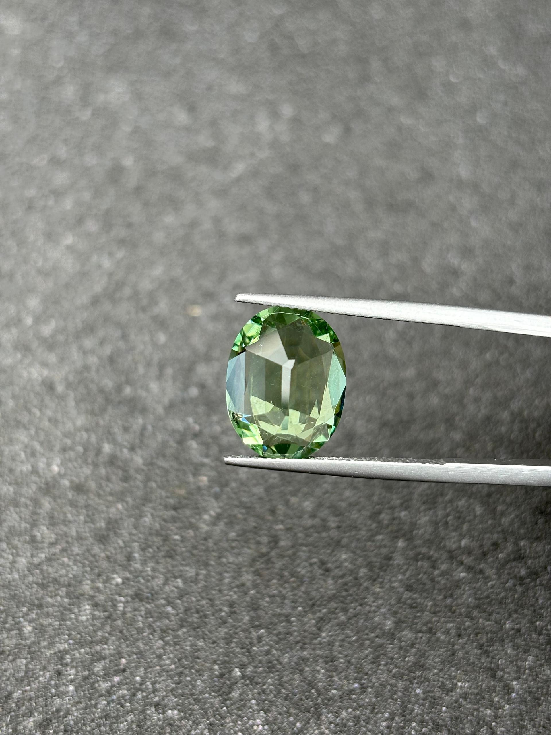 lime green green tourmaline, 6.72ct oval cut — view 6