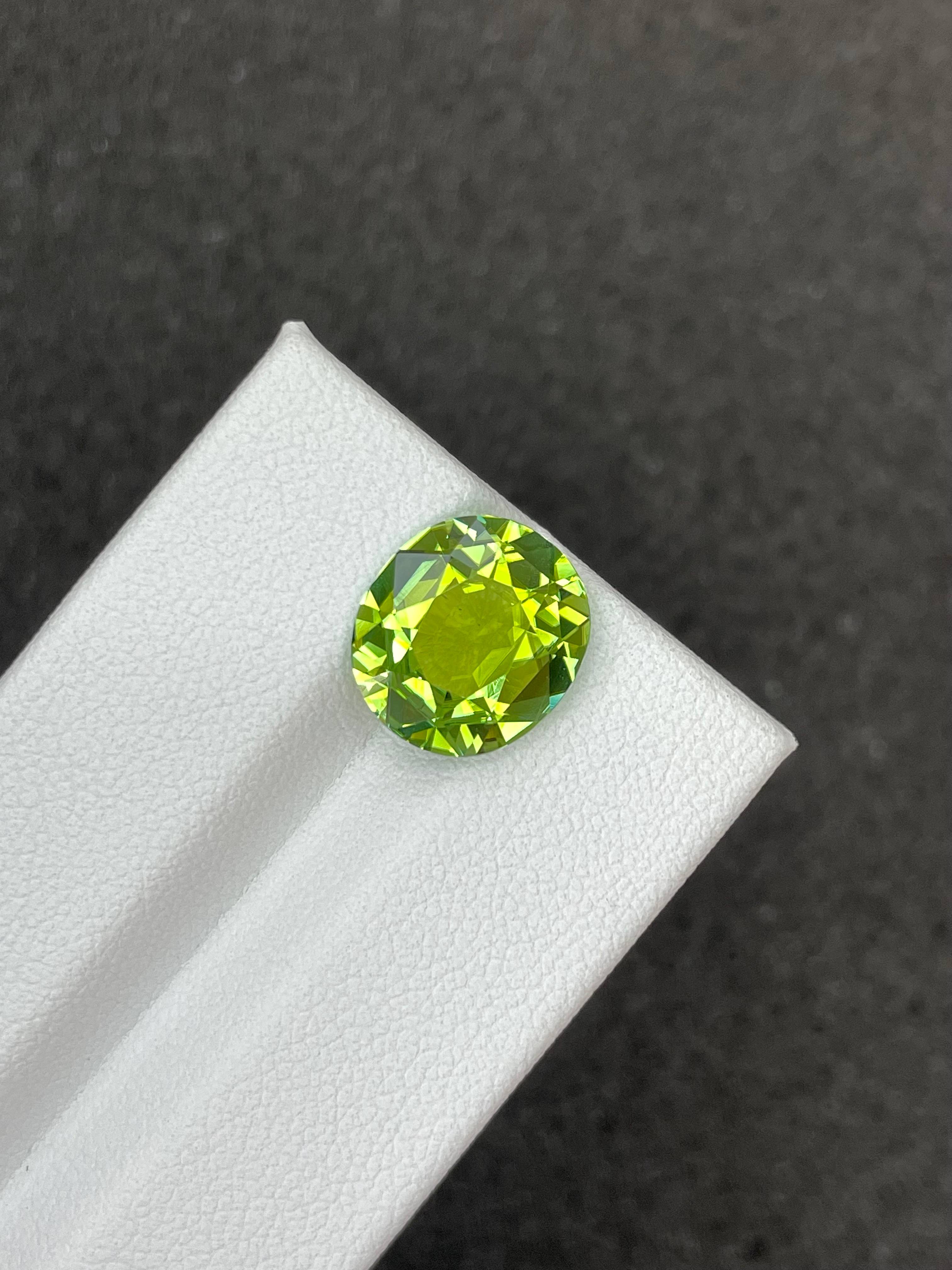 green green tourmaline, 4.01ct oval cut — view 5