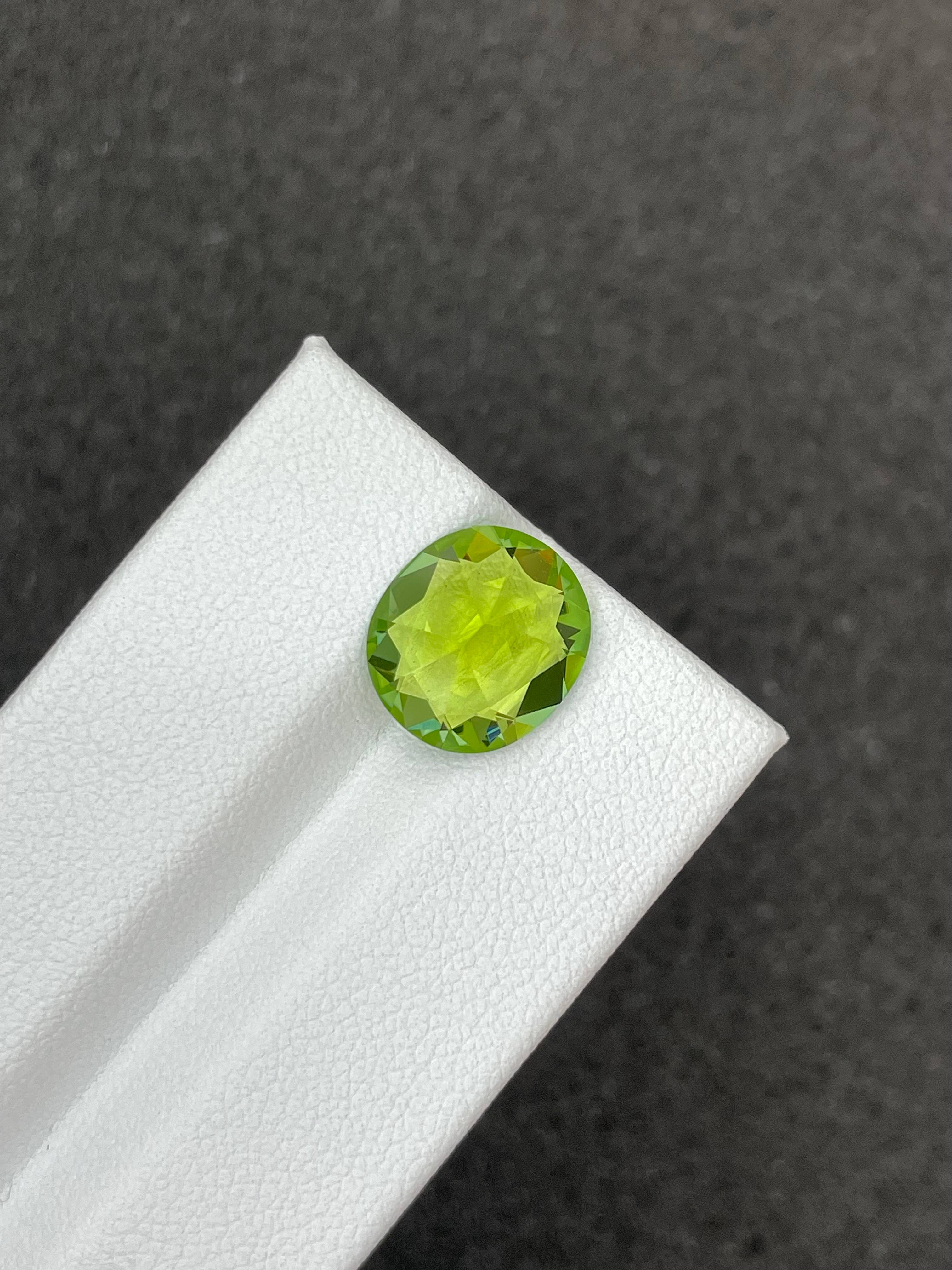 green green tourmaline, 4.01ct oval cut — view 6