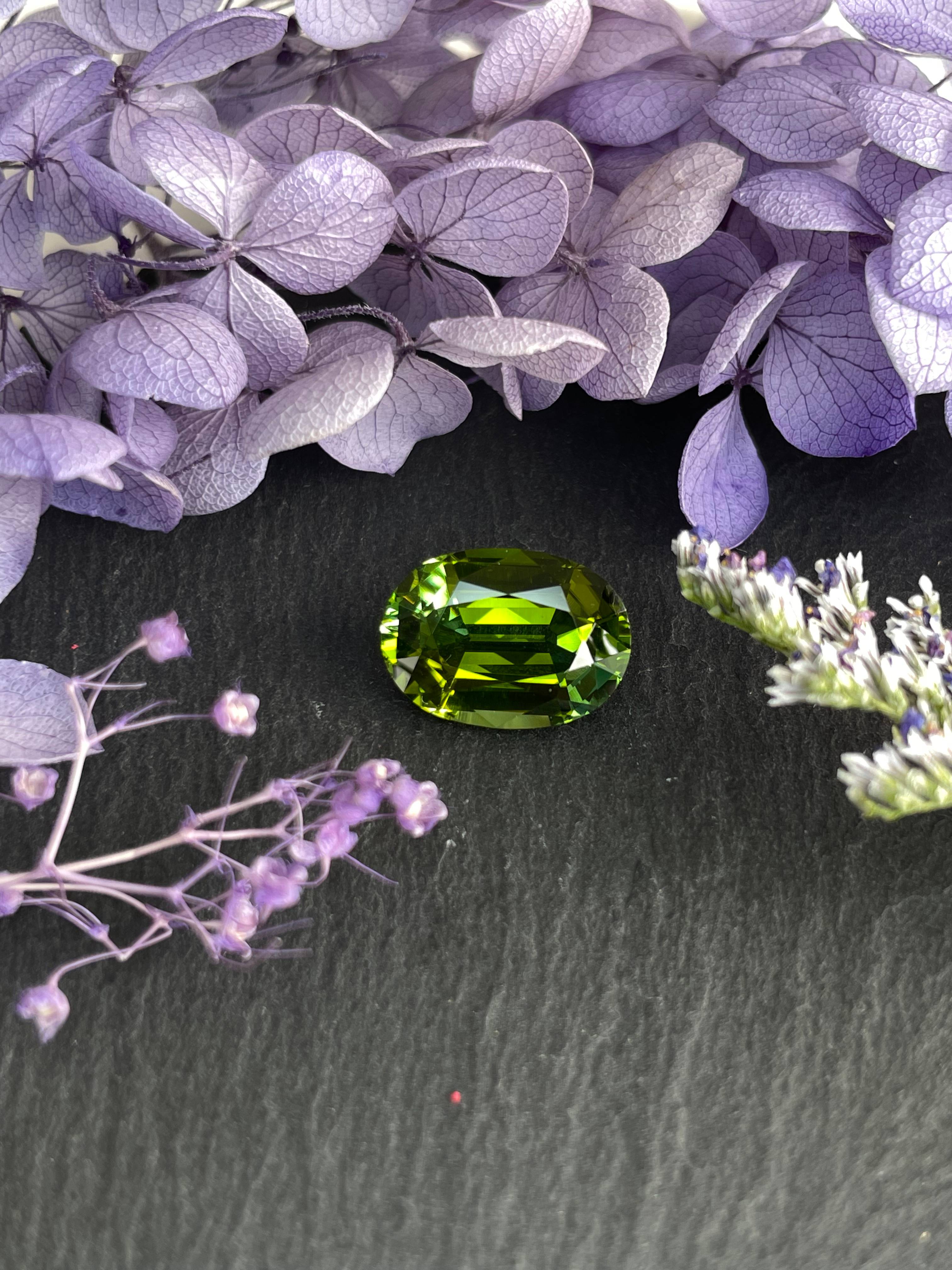 lime green green tourmaline, 6.09ct oval cut — view 5