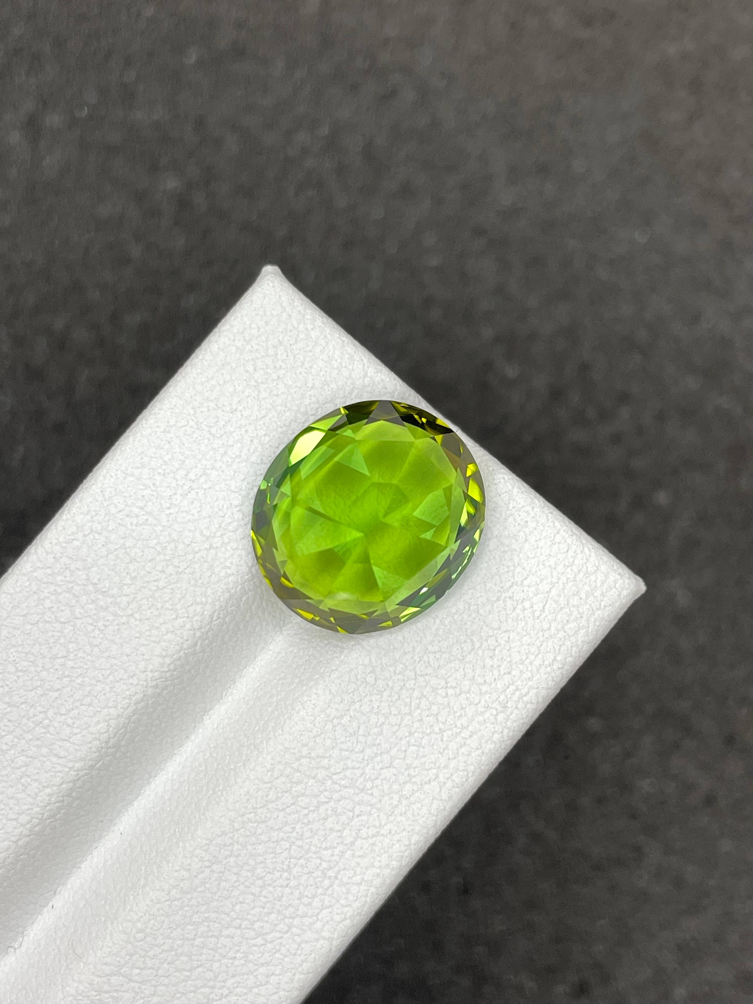 green green tourmaline, 12.66ct oval cut — view 6