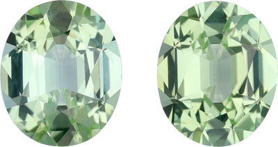 Oval cut green tourmaline, 12.04 by 10.01 mm, shown at actual size