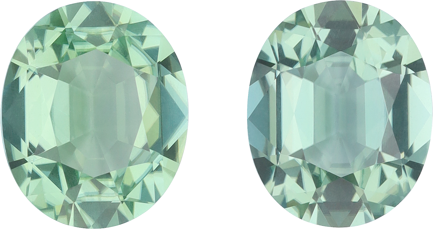 Oval cut green tourmaline, 11.2 by 9.19 mm, shown at actual size