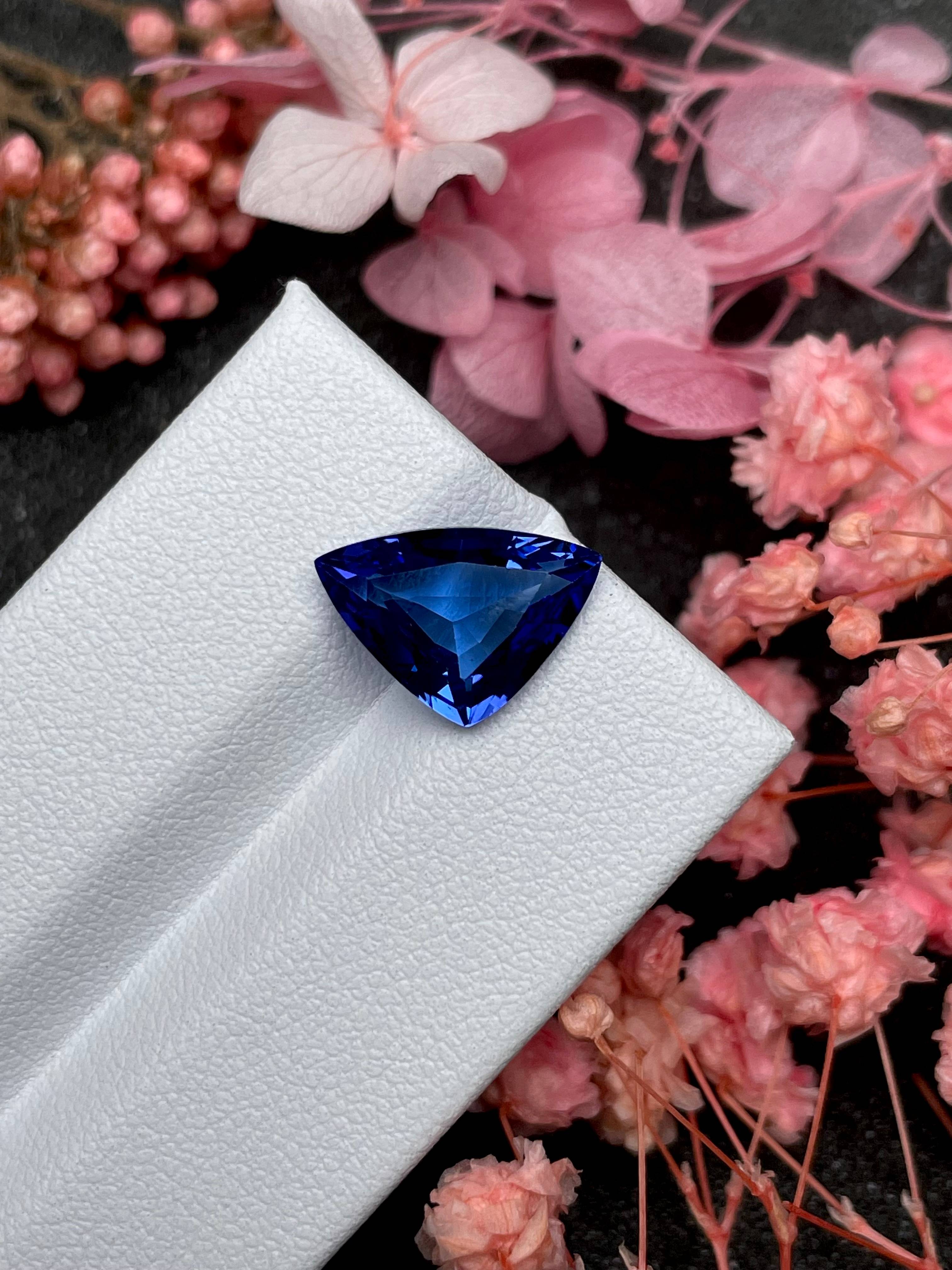 AA violet blue tanzanite, 3.99ct trilliant cut — view 5