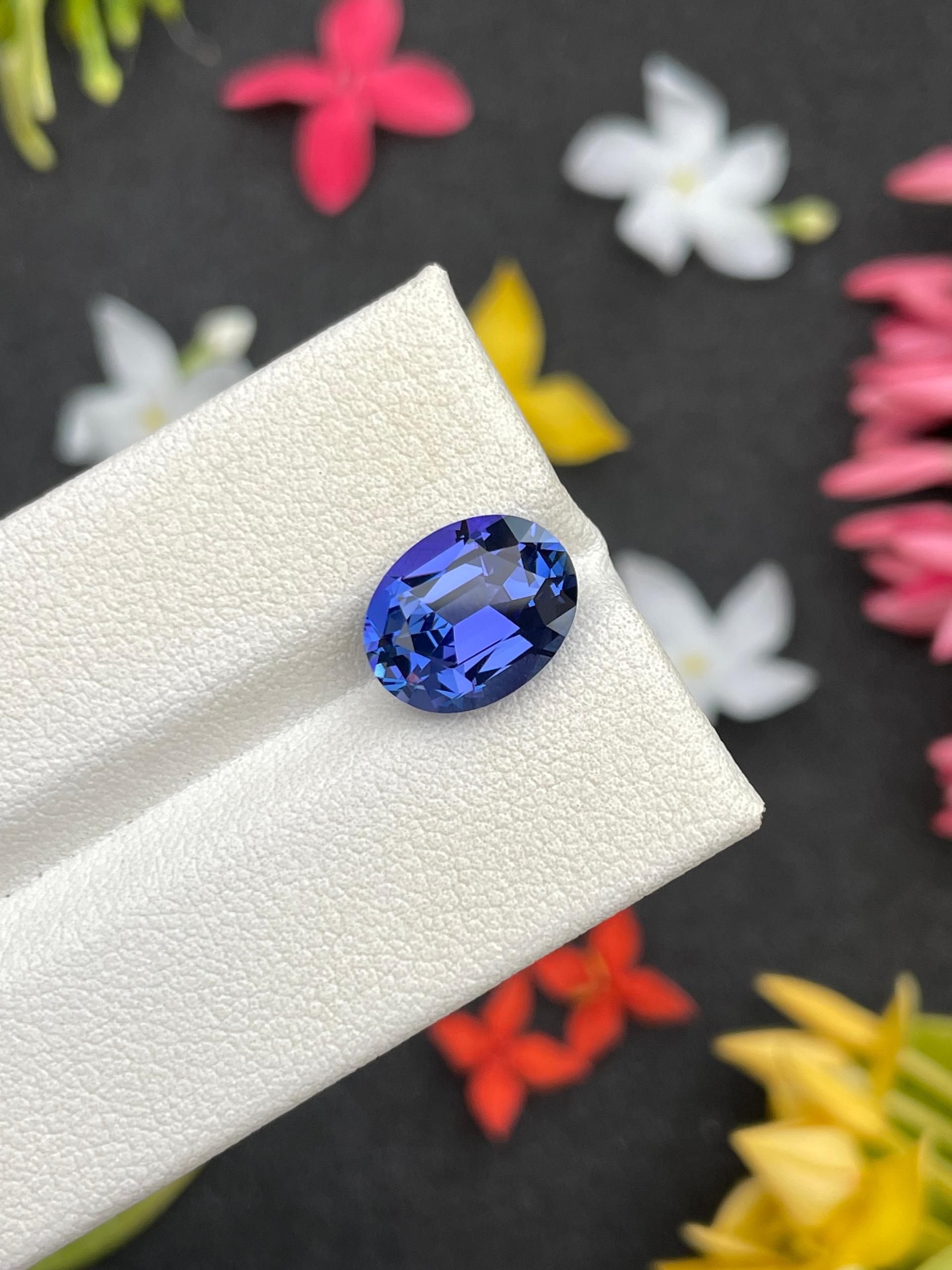 AA violet blue tanzanite, 4.11ct oval cut — view 5