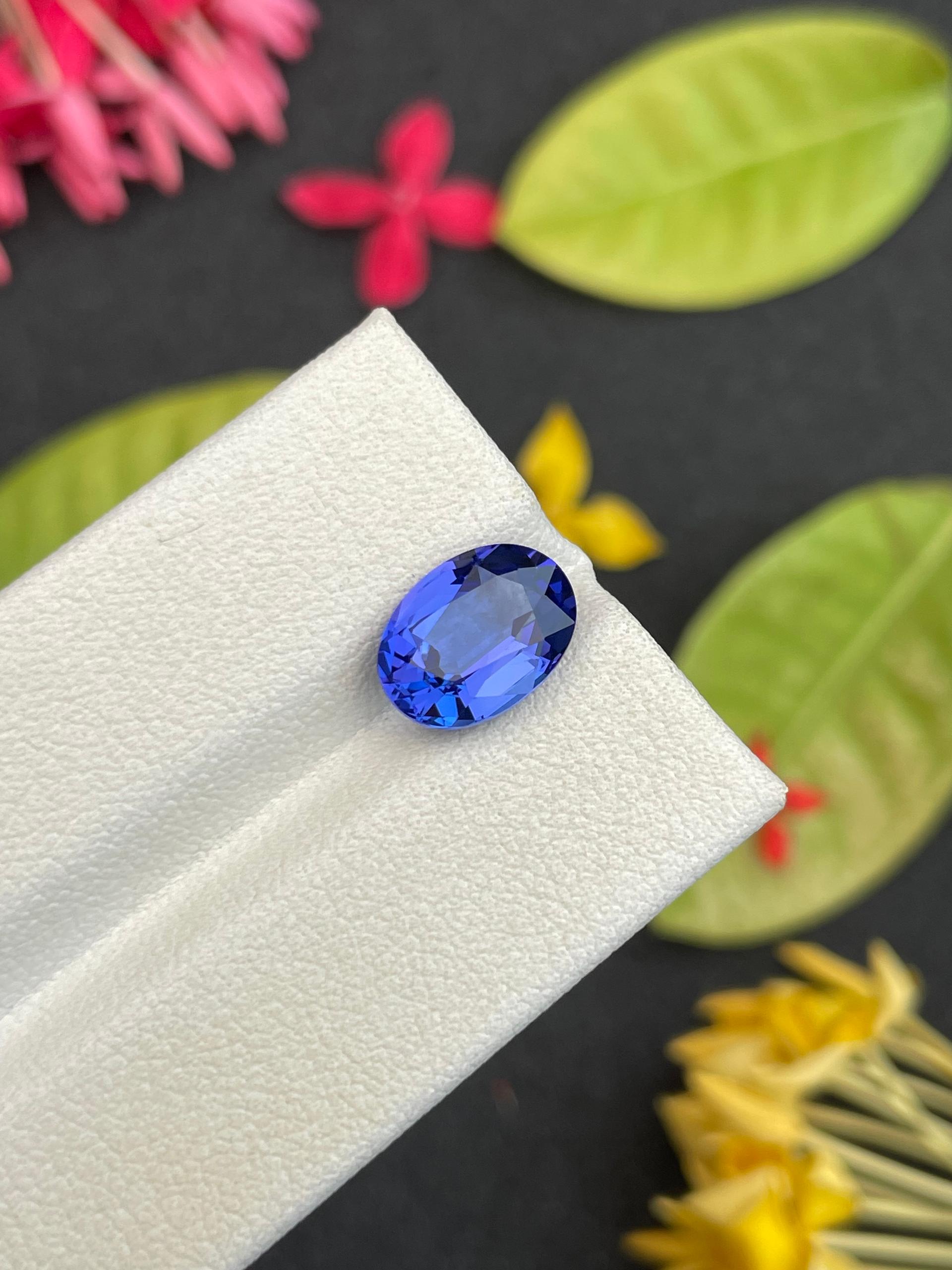 AA violet blue tanzanite, 3.25ct oval cut — view 8