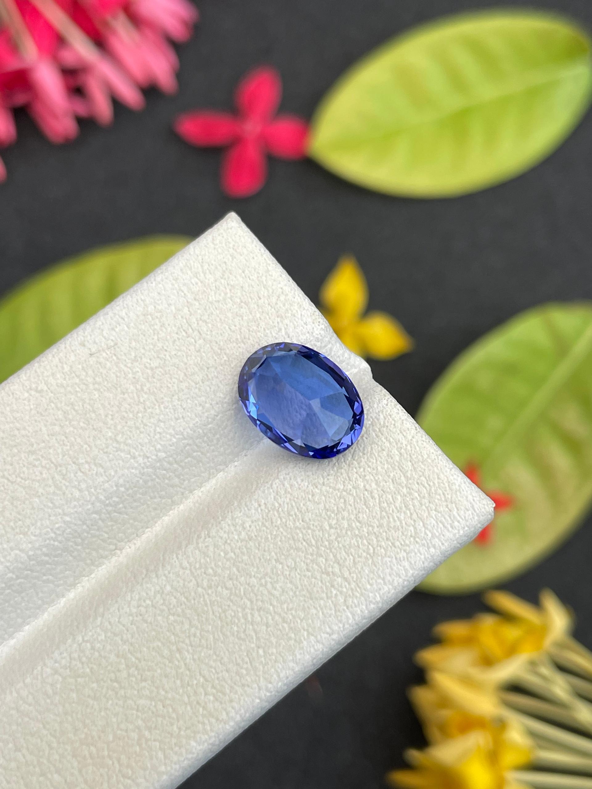 AA violet blue tanzanite, 3.25ct oval cut — view 10