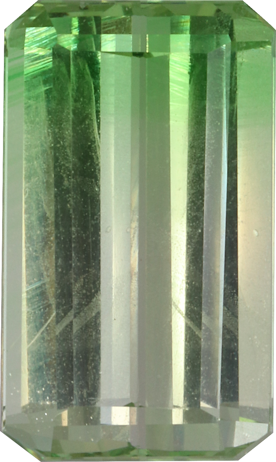Rectangular cut tsavorite garnet, 11 by 6.47 mm, shown at actual size