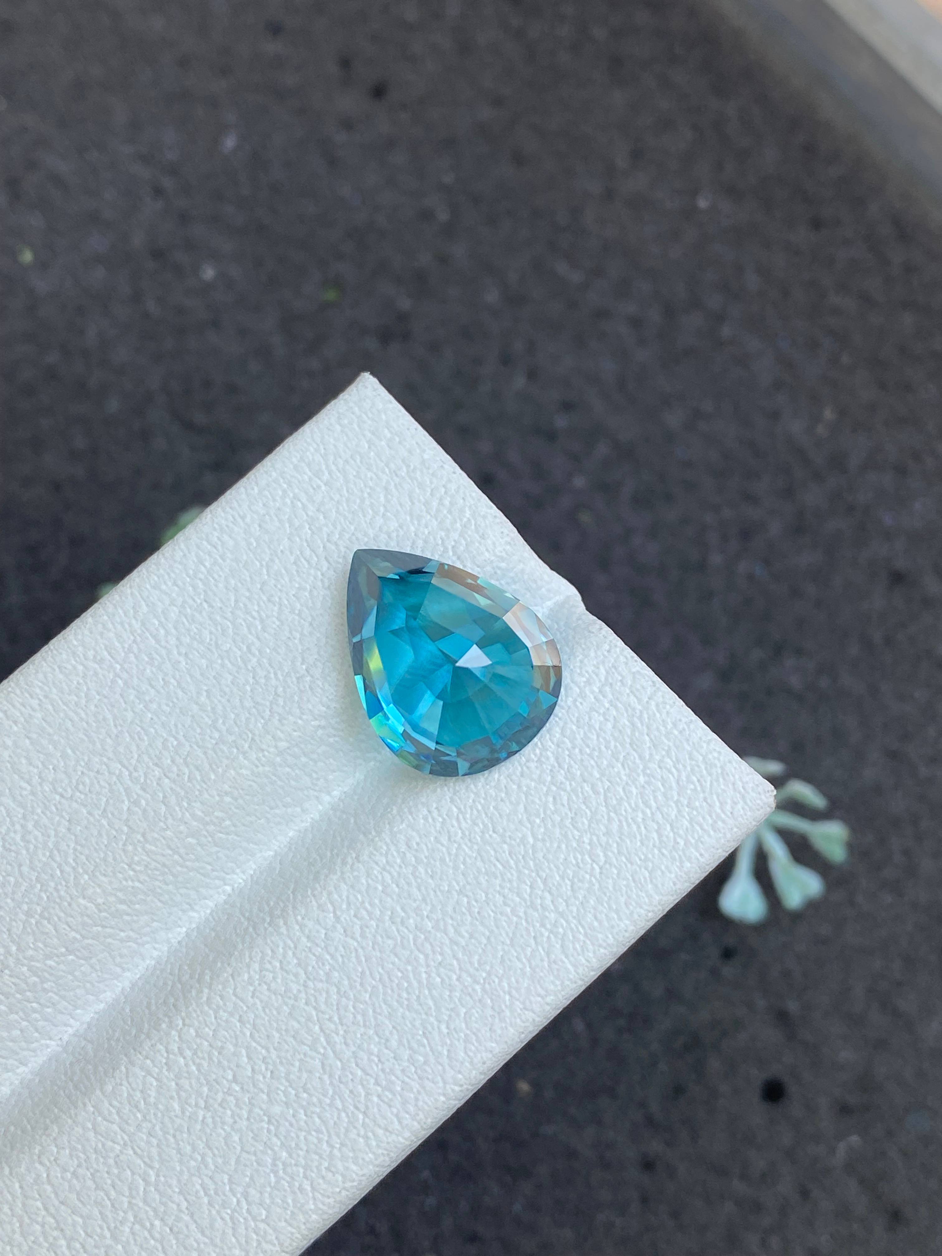 blue blue zircon, 8.63ct pear cut — view 6