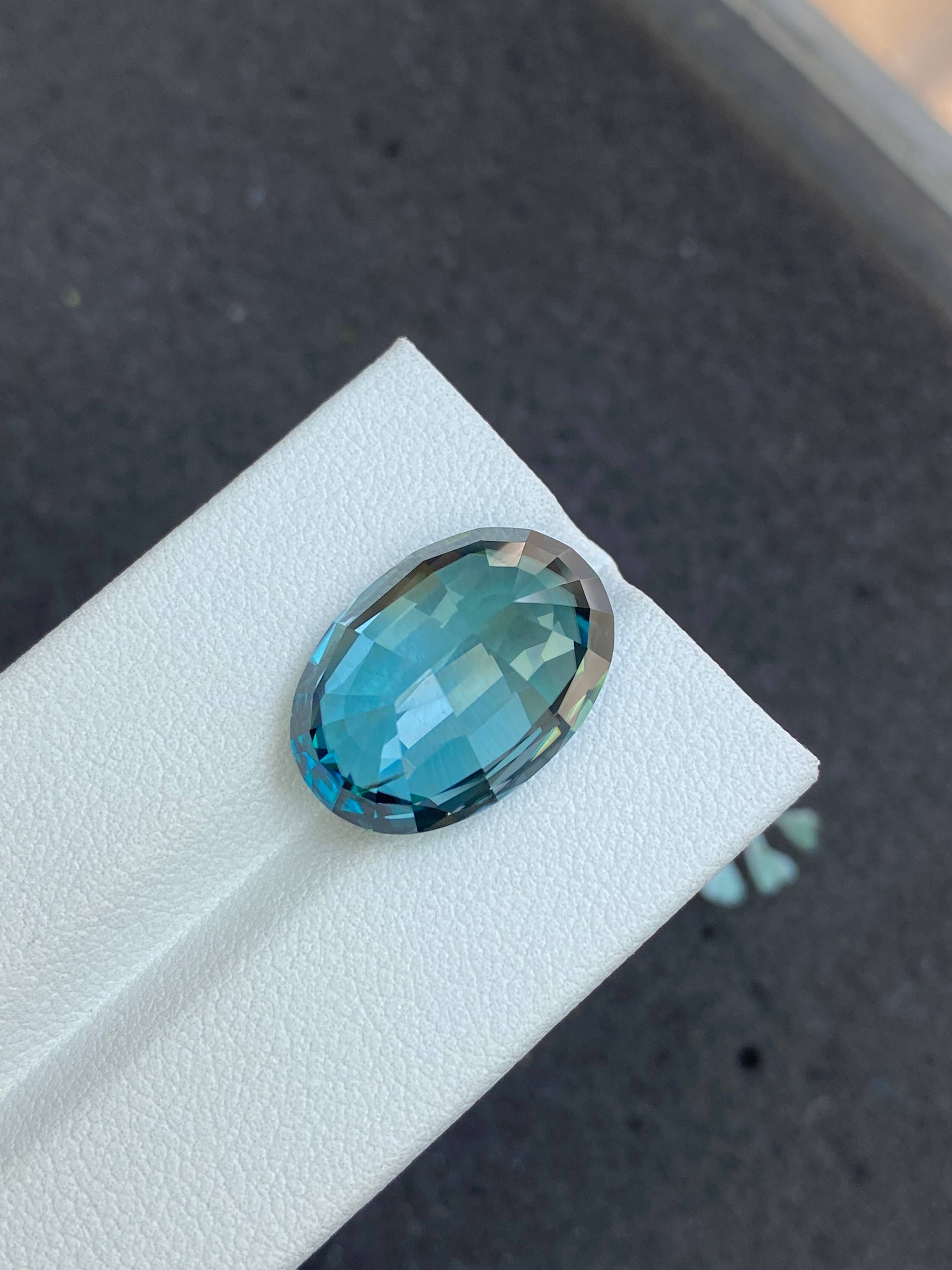 blue blue zircon, 21.89ct oval cut — view 6