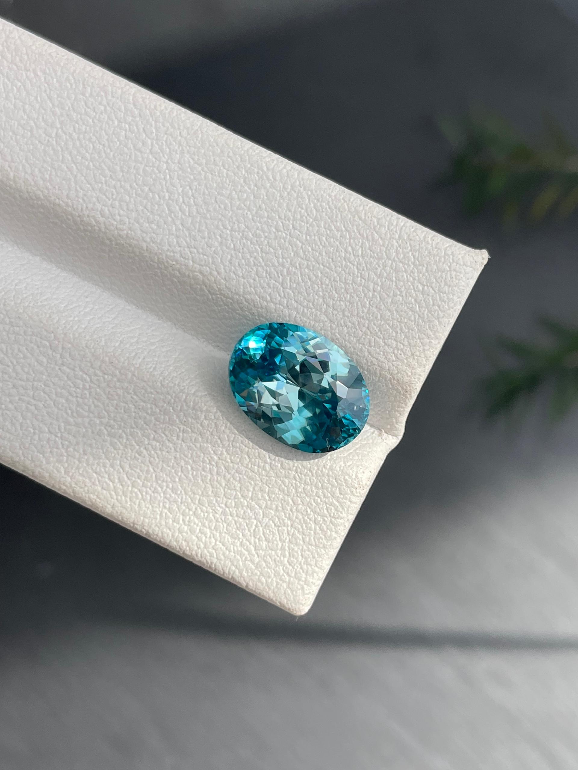 blue blue zircon, 6.12ct oval cut — view 6