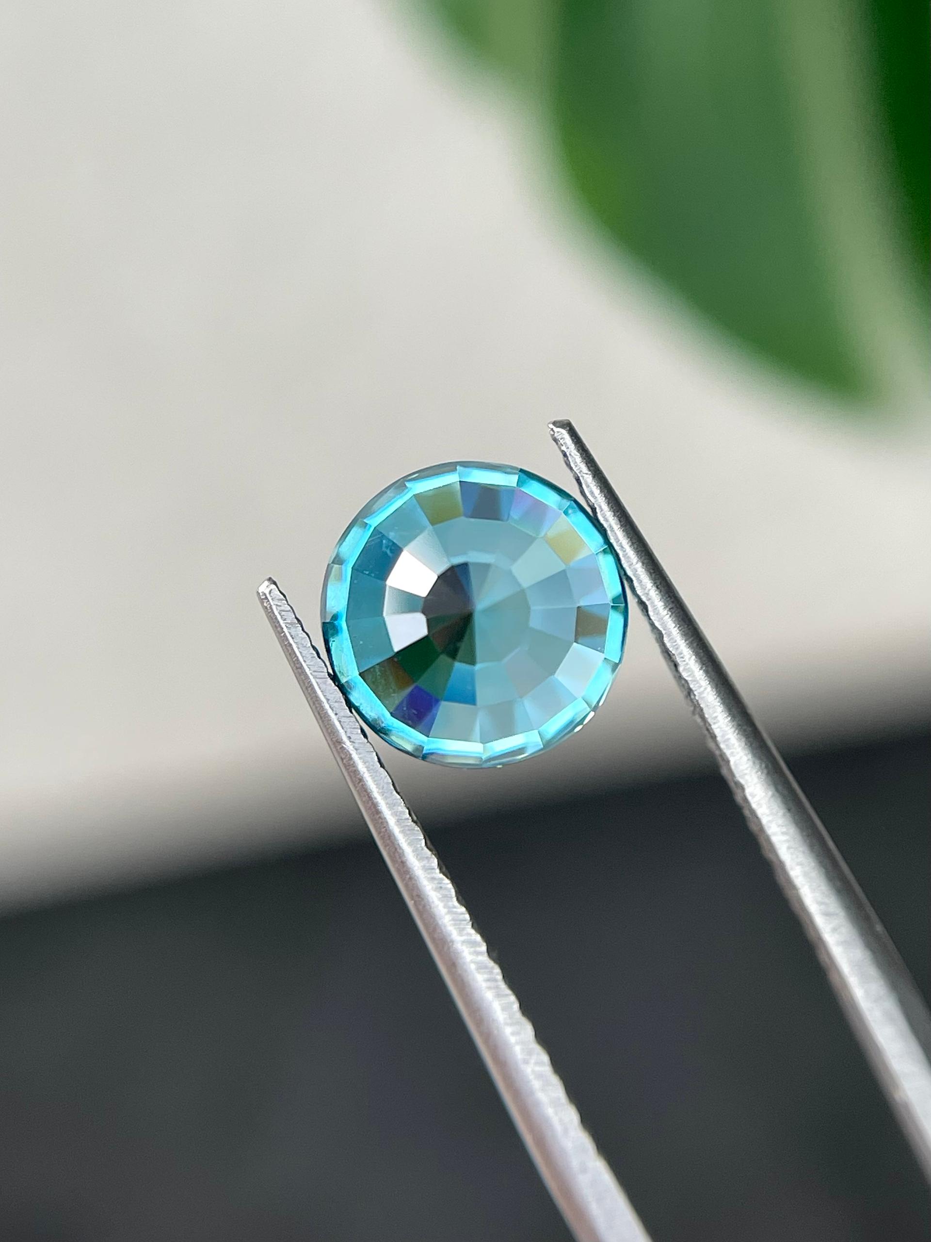 blue blue zircon, 5.01ct oval cut — view 6