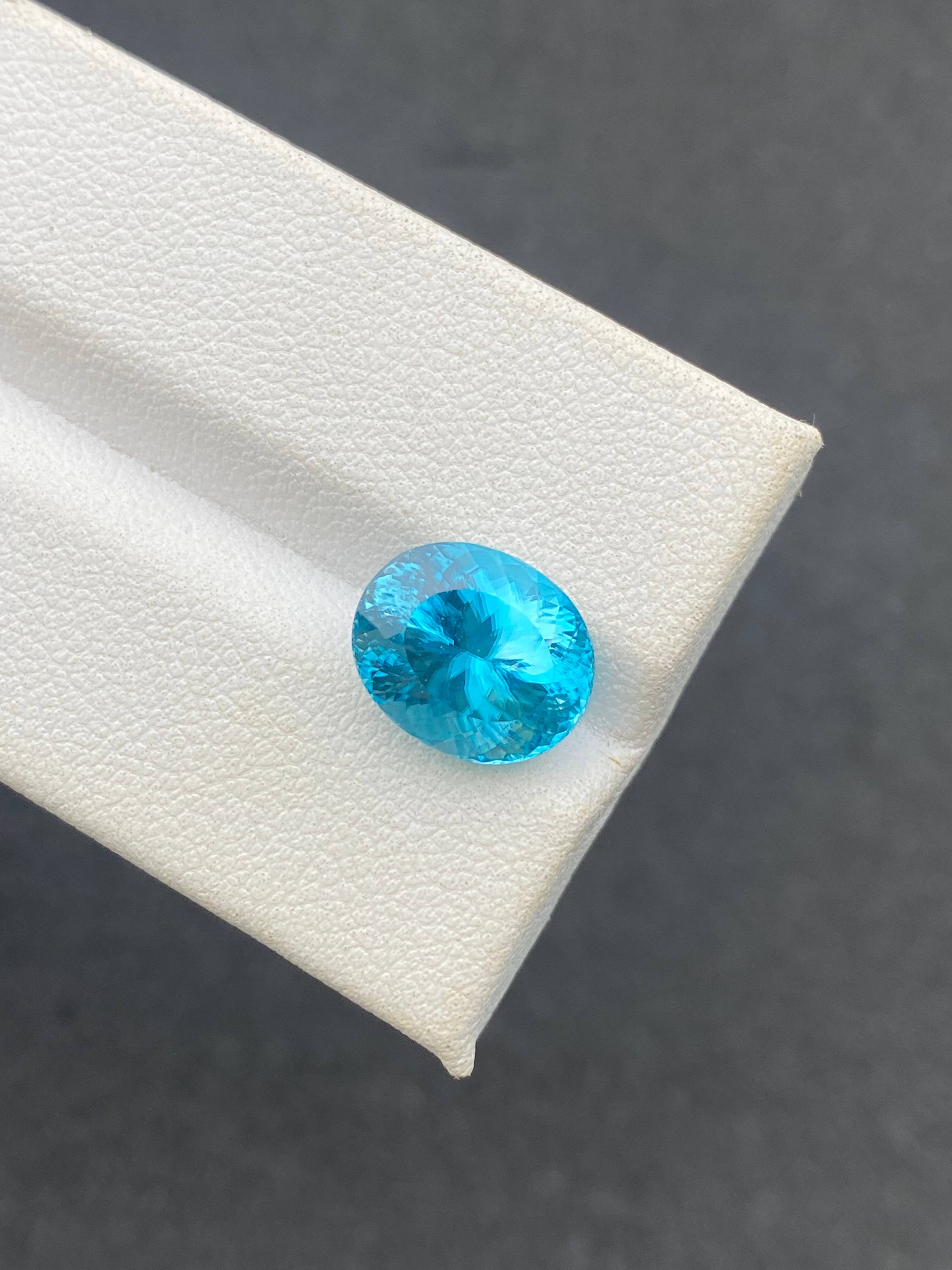 blue blue zircon, 6.81ct oval cut — view 6