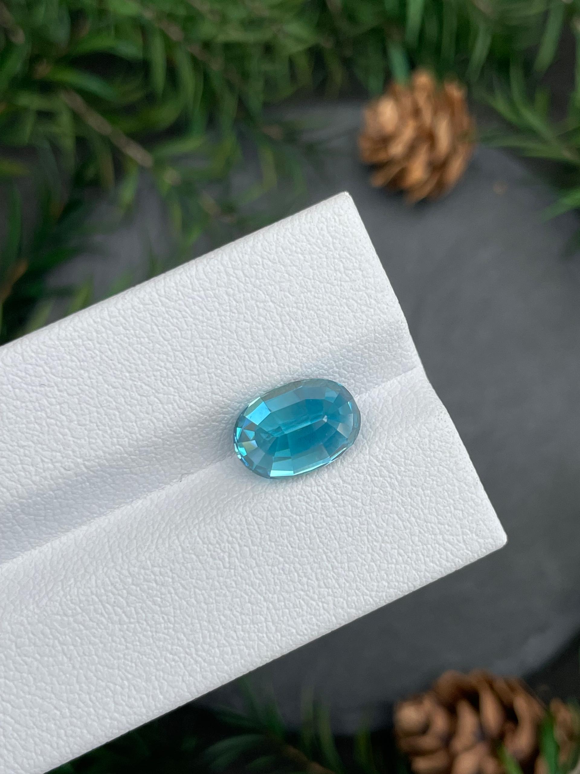 blue blue zircon, 5.8ct oval cut — view 7