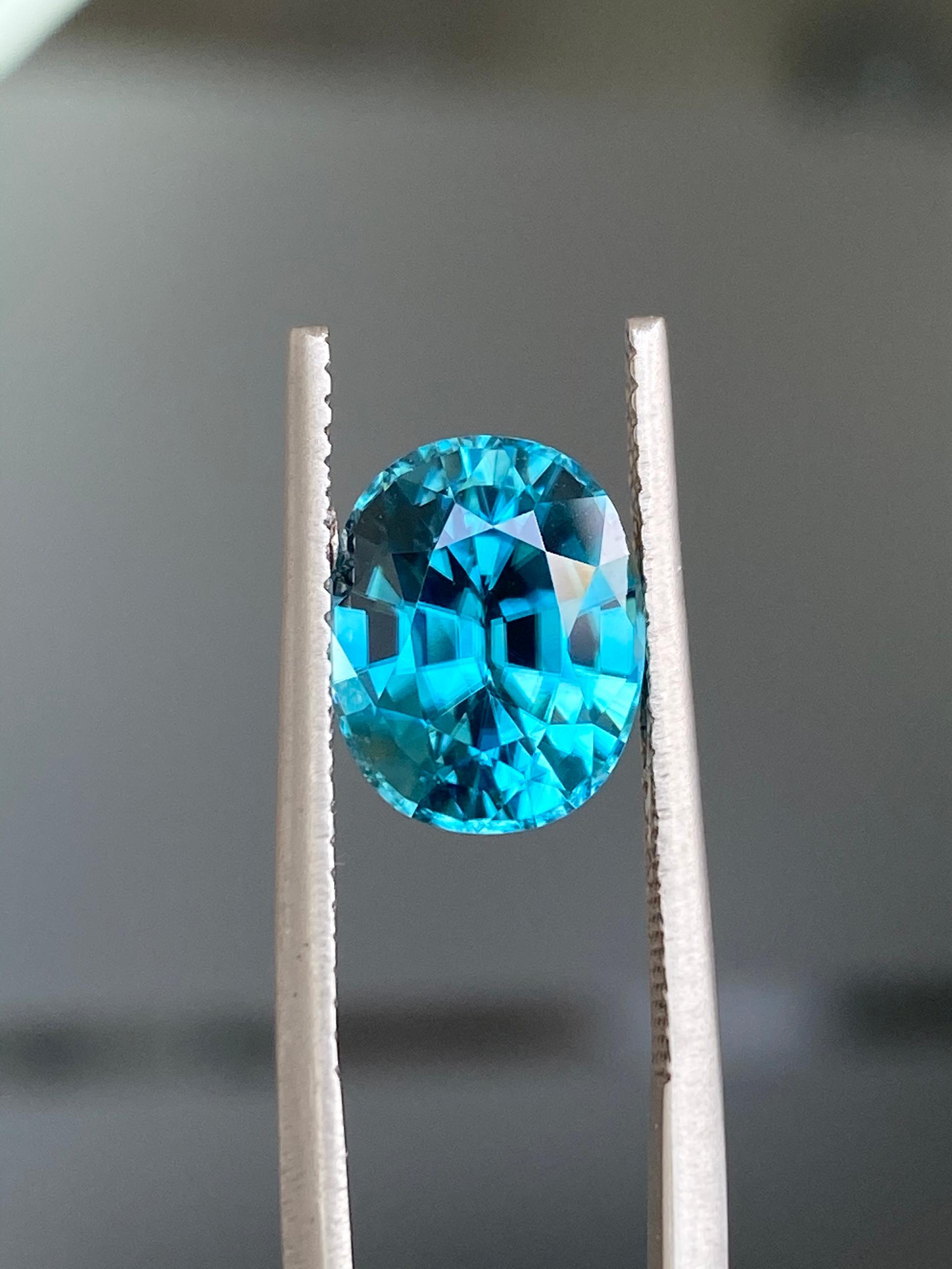 blue blue zircon, 5.28ct oval cut — view 5