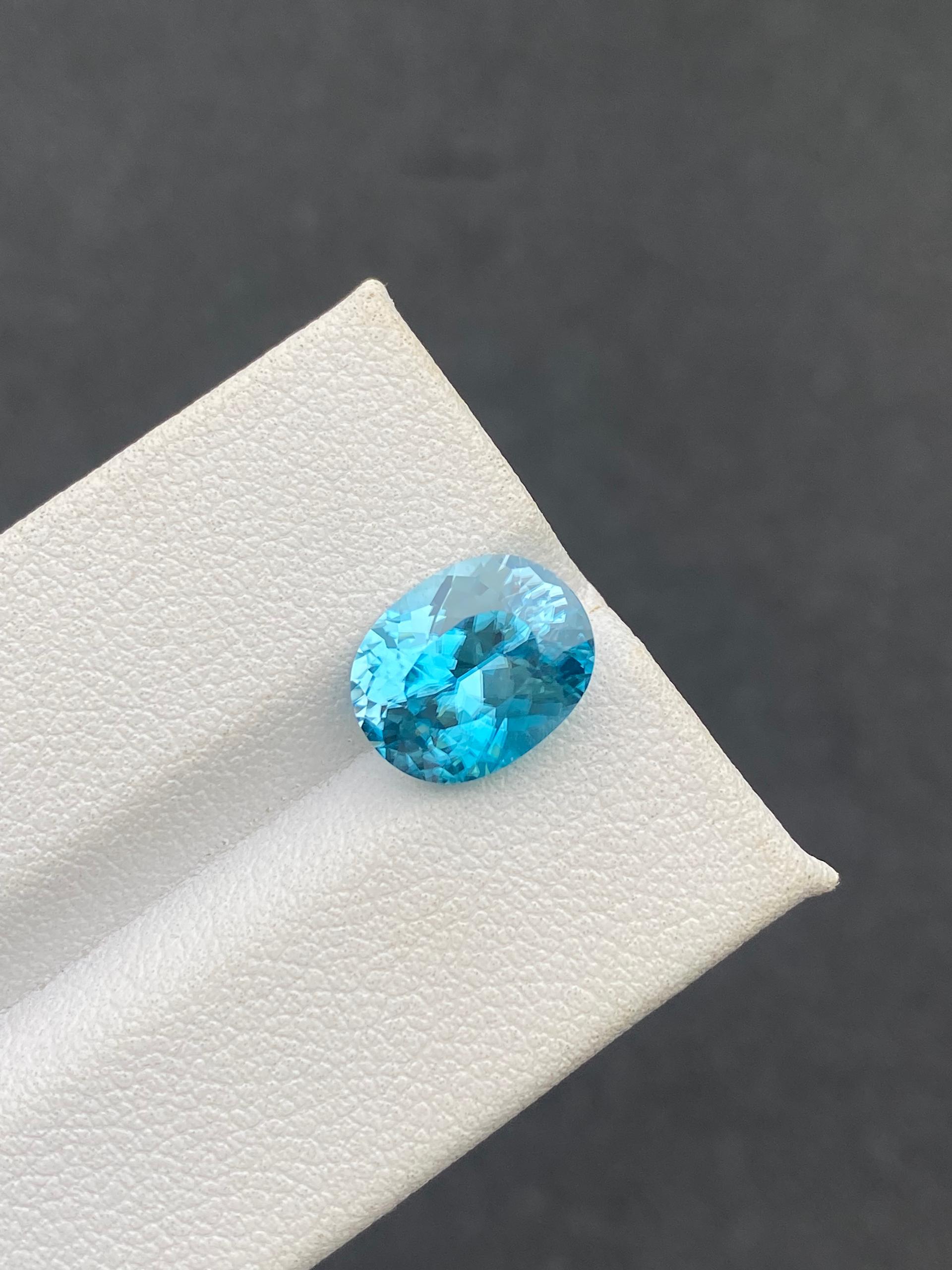 blue blue zircon, 5.5ct oval cut — view 5