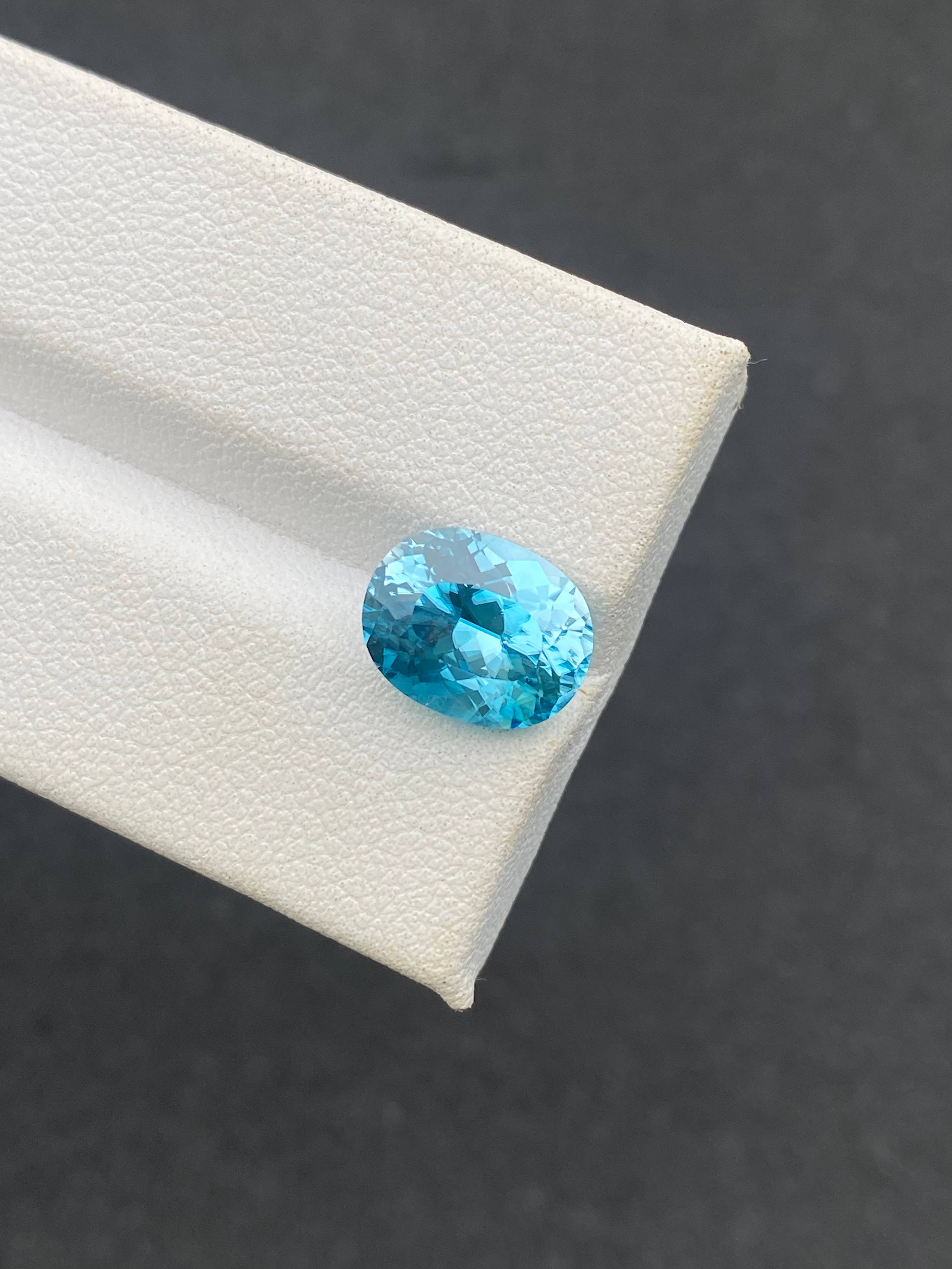 blue blue zircon, 5.5ct oval cut — view 6