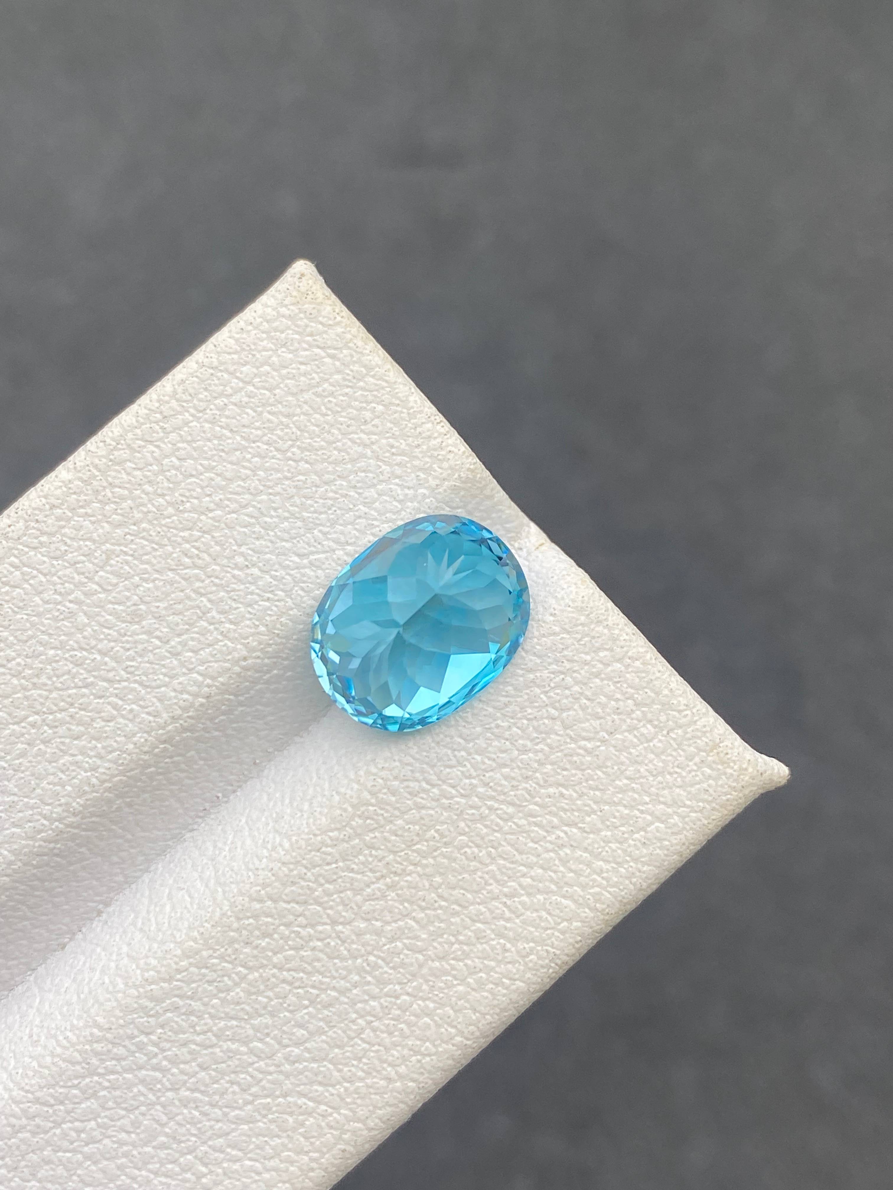 blue blue zircon, 5.5ct oval cut — view 7