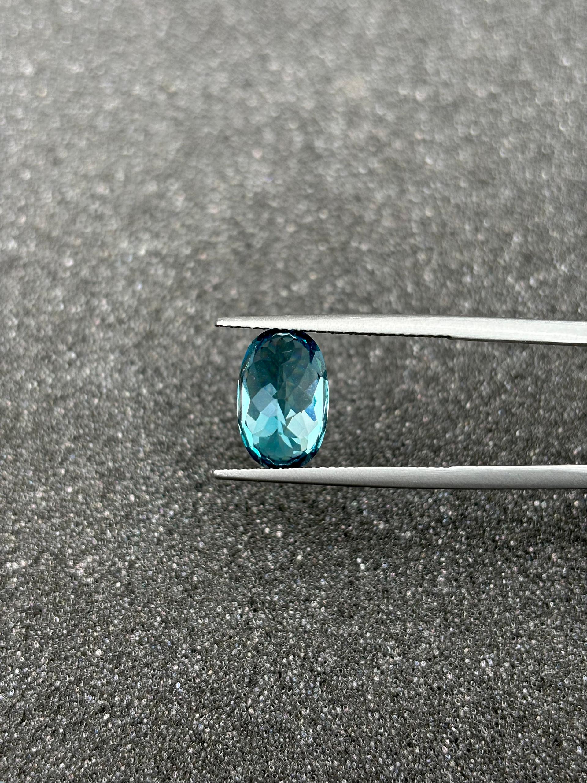 blue blue zircon, 7.17ct oval cut — view 5