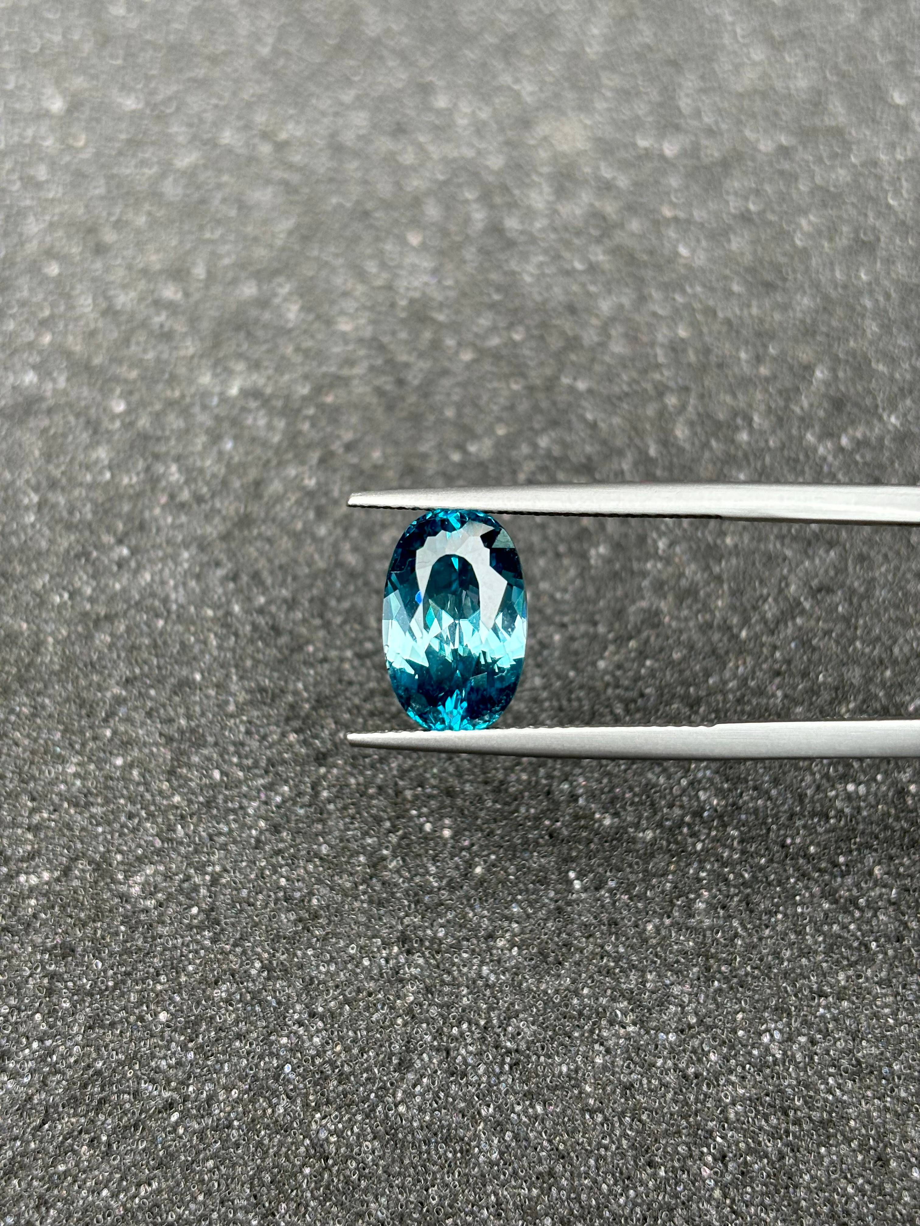 blue blue zircon, 7.17ct oval cut — view 6