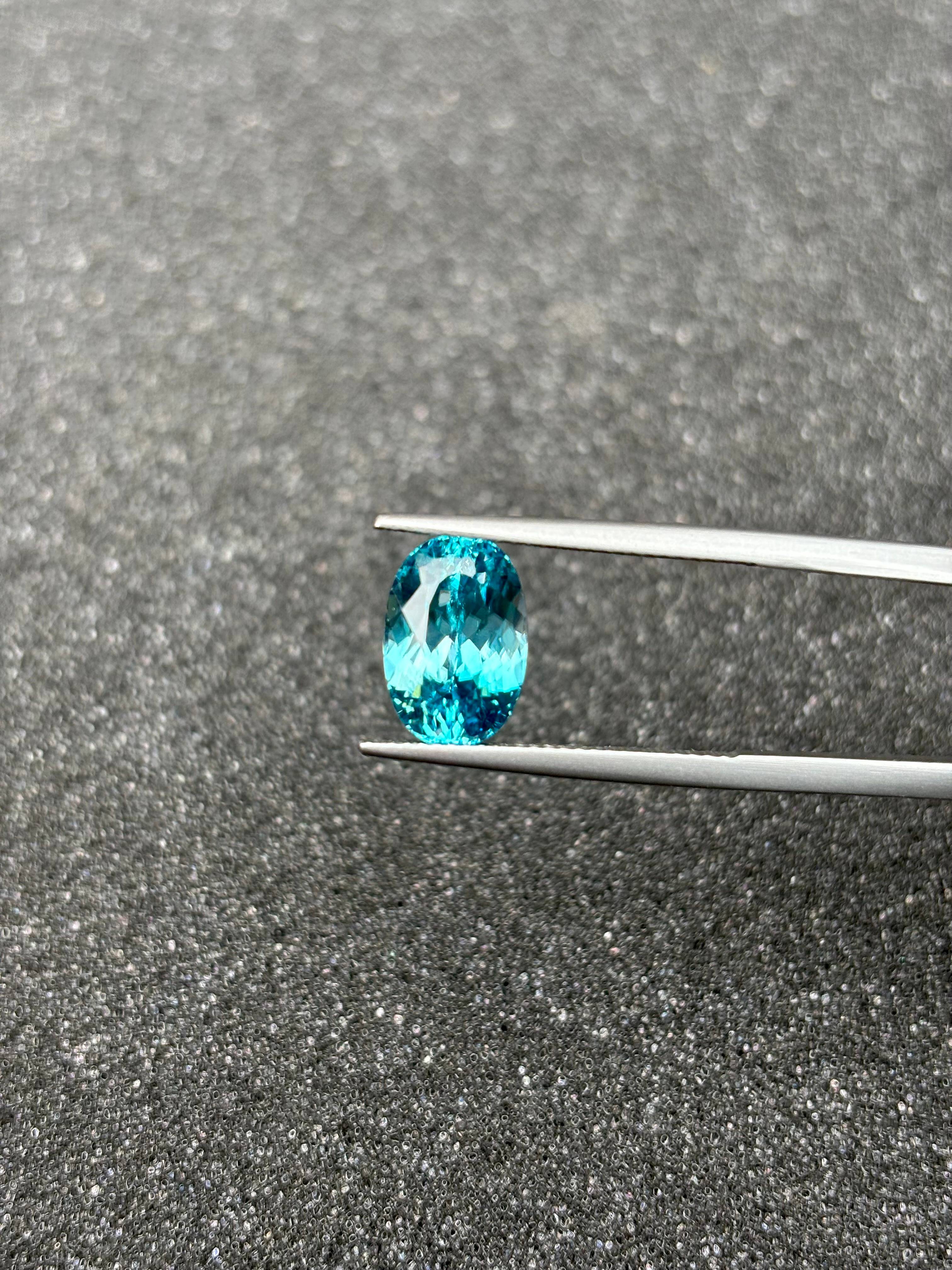 blue blue zircon, 6.47ct oval cut — view 5