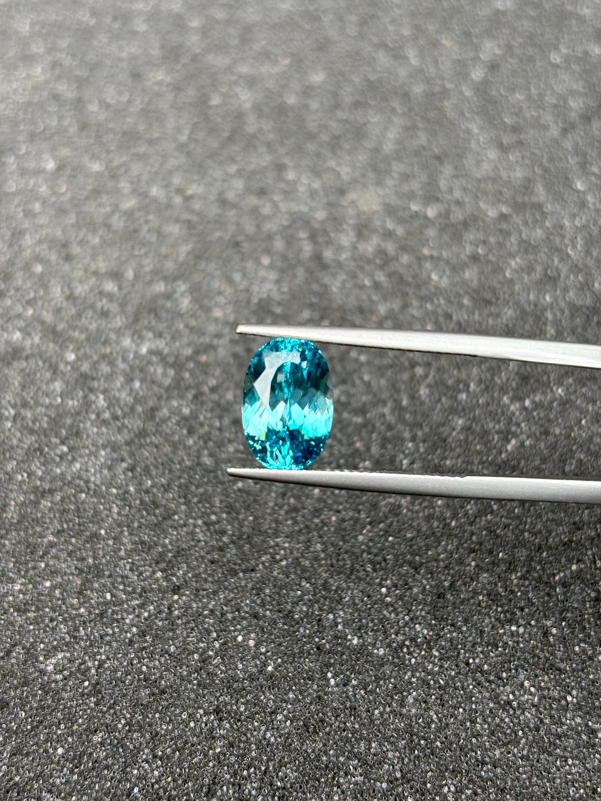 blue blue zircon, 6.47ct oval cut — view 5