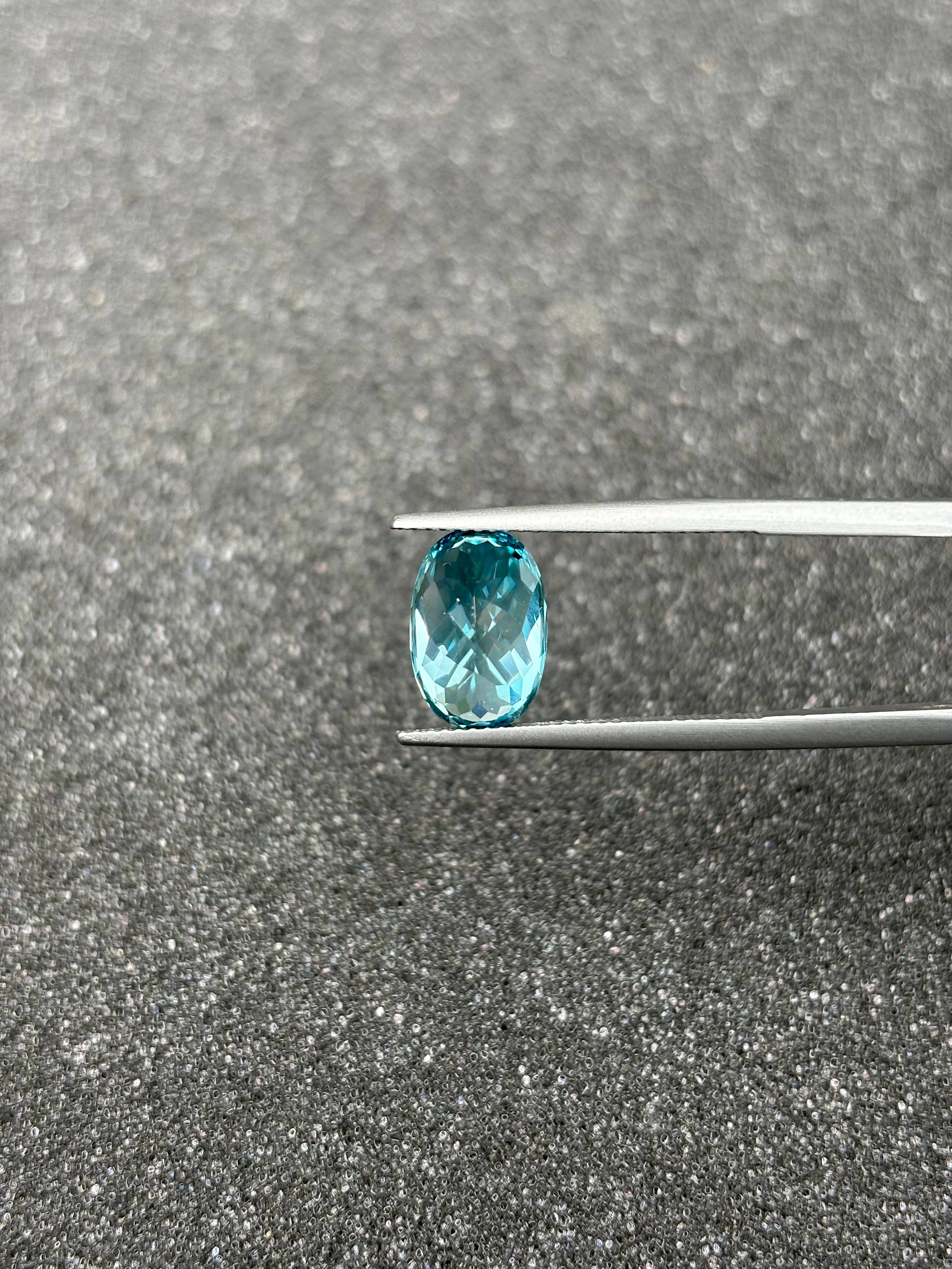 blue blue zircon, 6.47ct oval cut — view 6